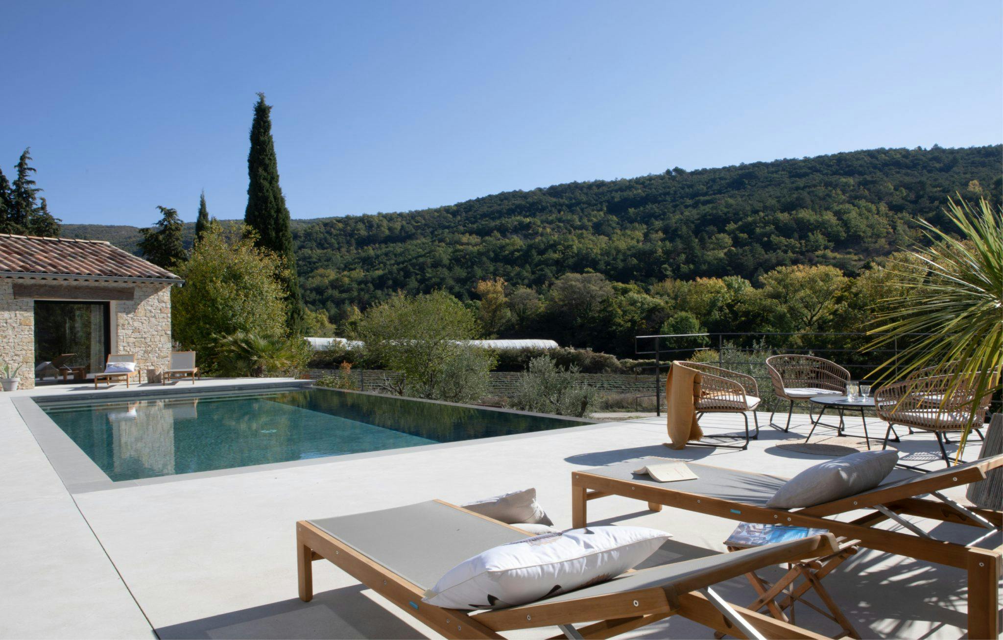 deckchair overlooking the countryside, by the pool