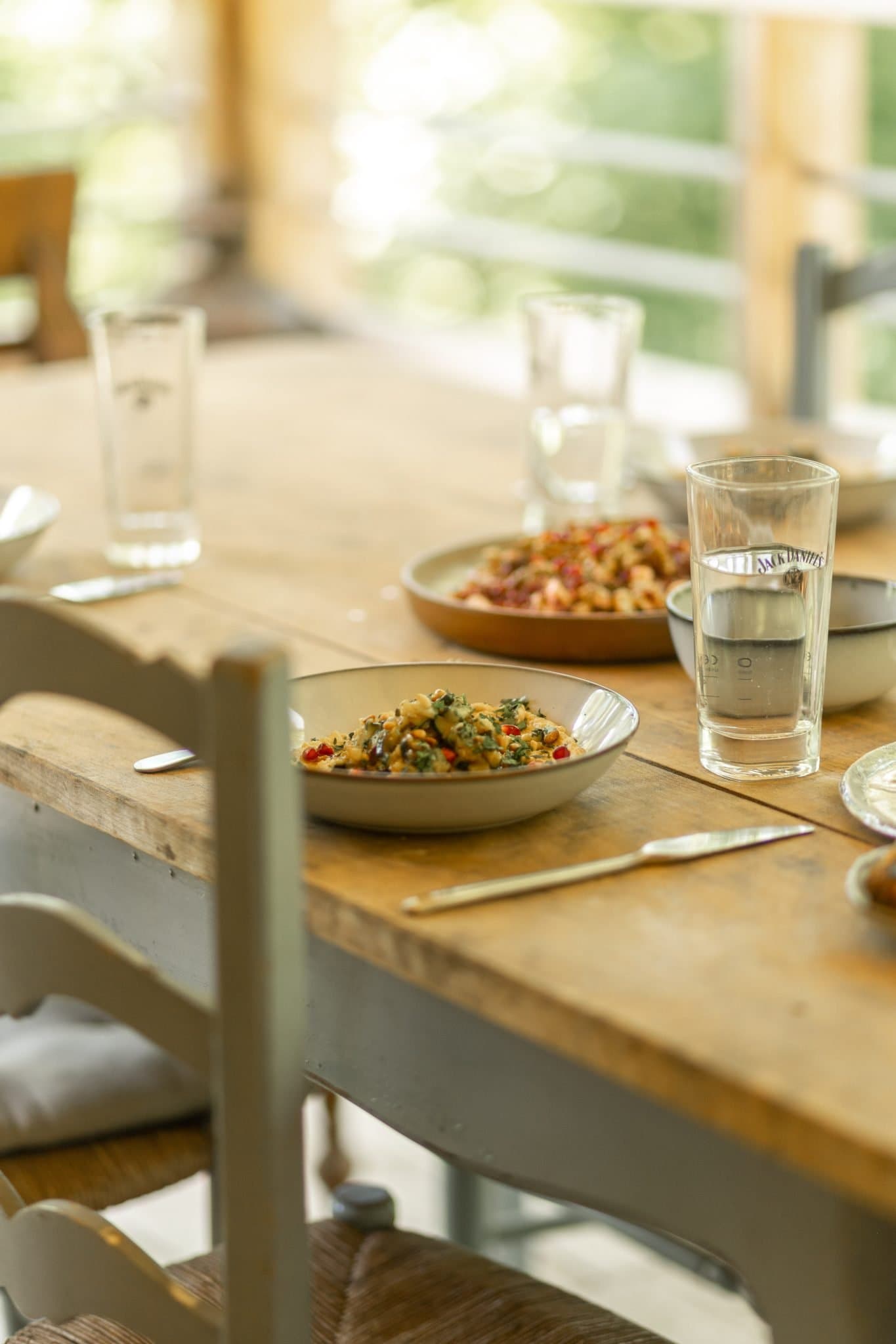 detail of the dining room: the table set for lunch
