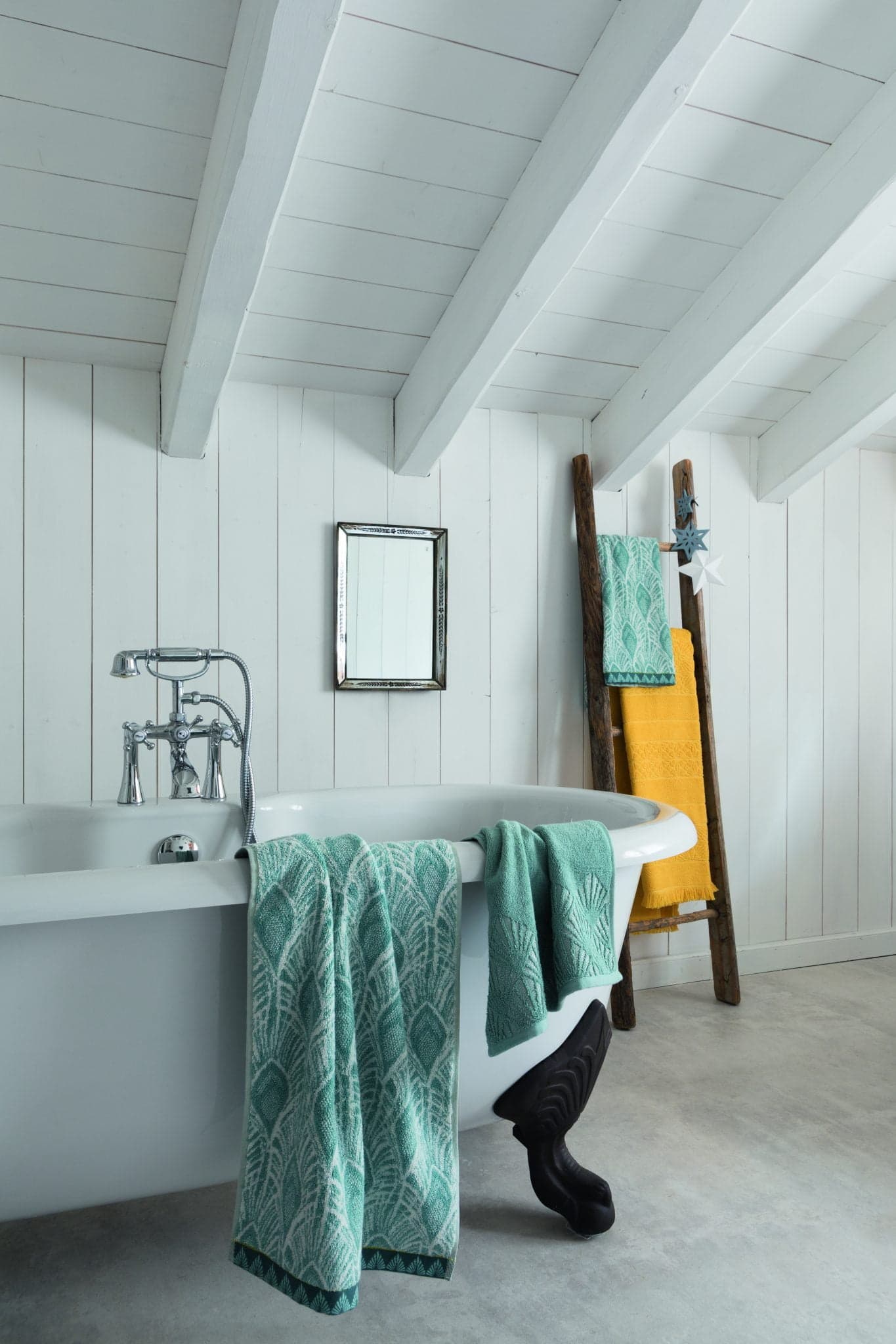 white wooden bathroom with bath