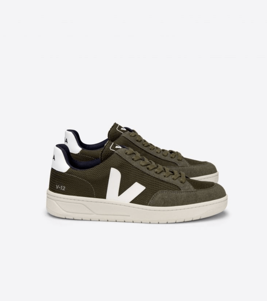olive and white sneakers with a v