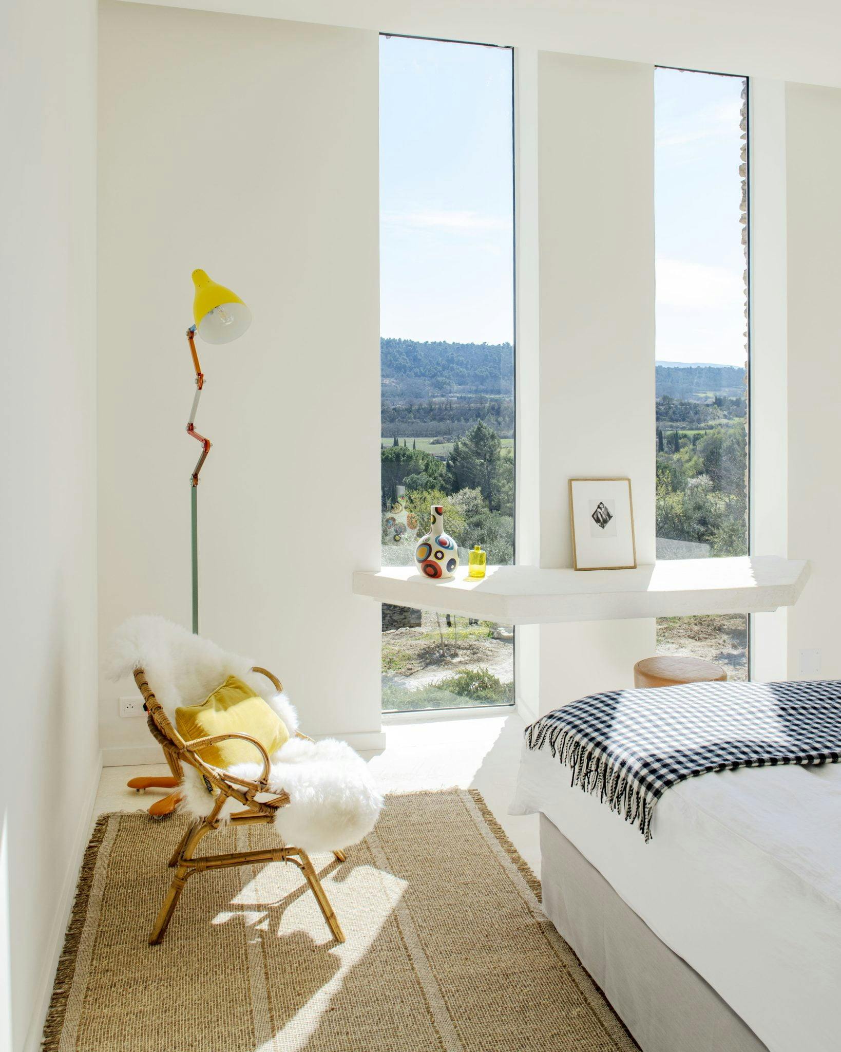 View on nature from one of the 70s inspired decorated room in the Atelier of Les Milles Roches