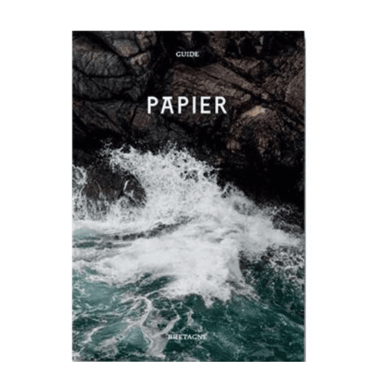 guide with a photo of crashing waves on the cover