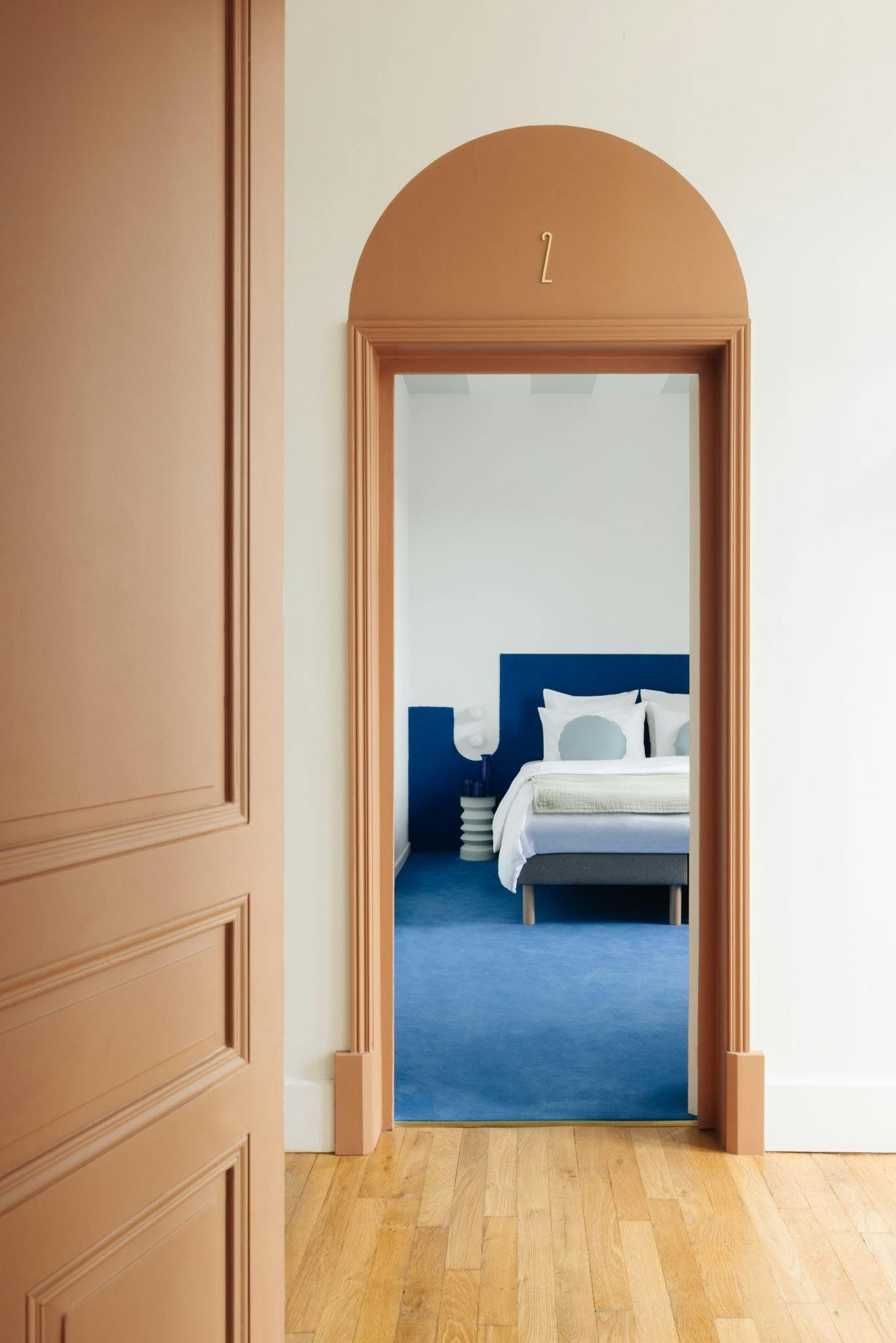access to the blue bedroom through terracotta entrances