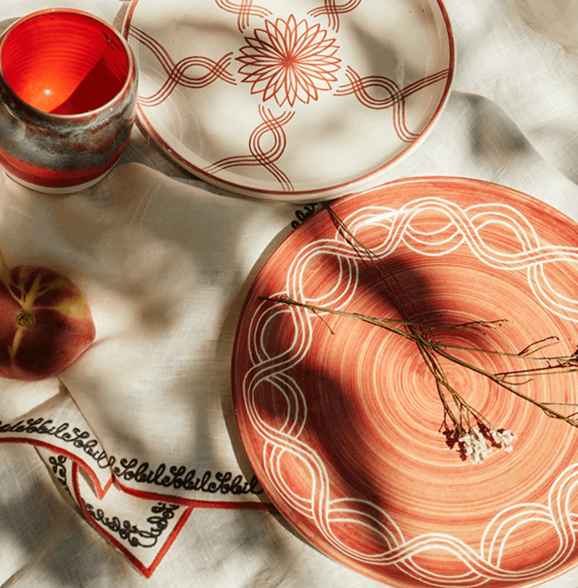 red plate in a sunny table