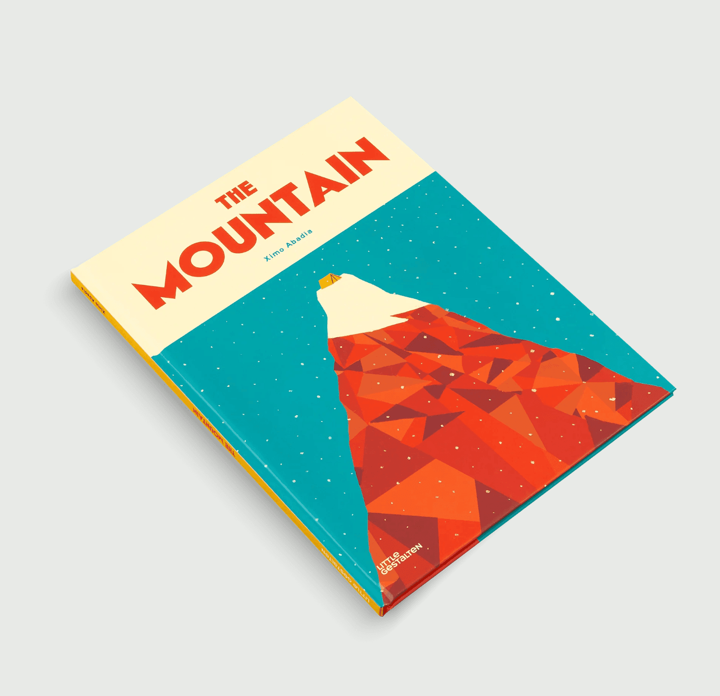 book with a drawing of a mountain