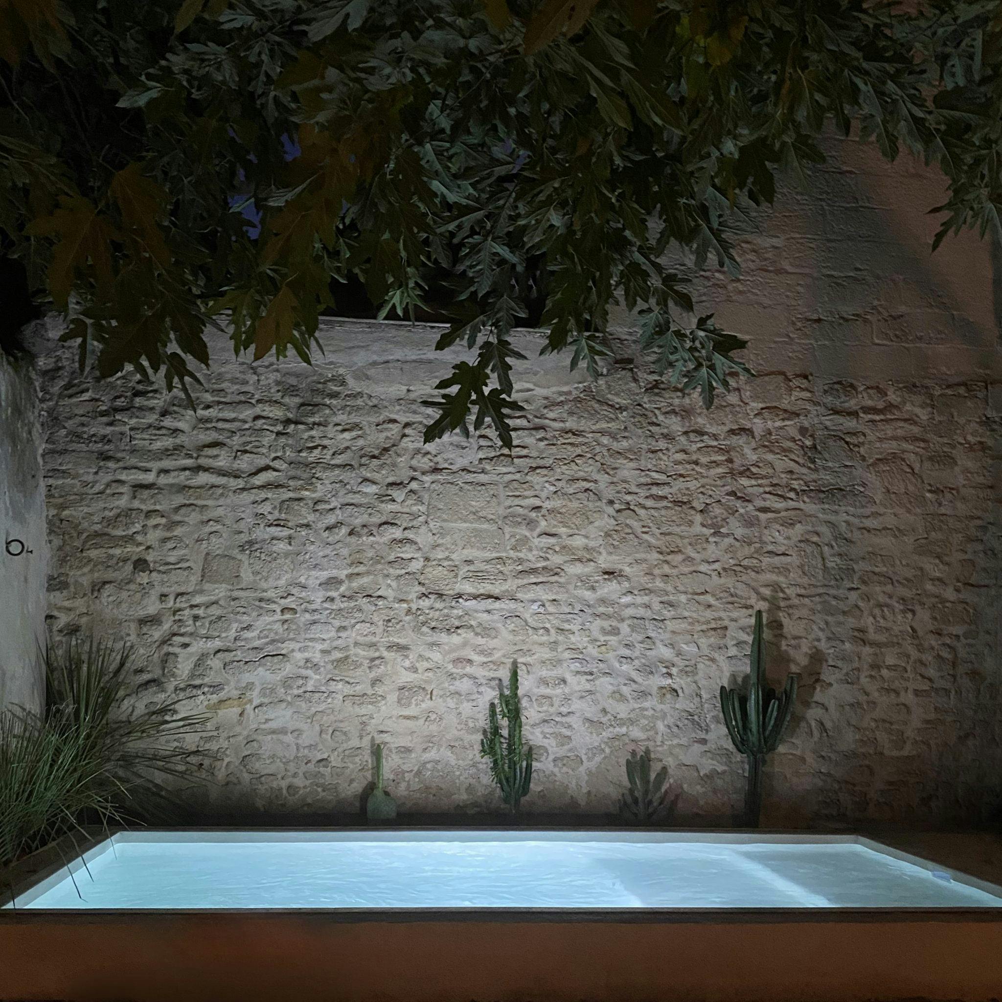 Illuminated pool at night