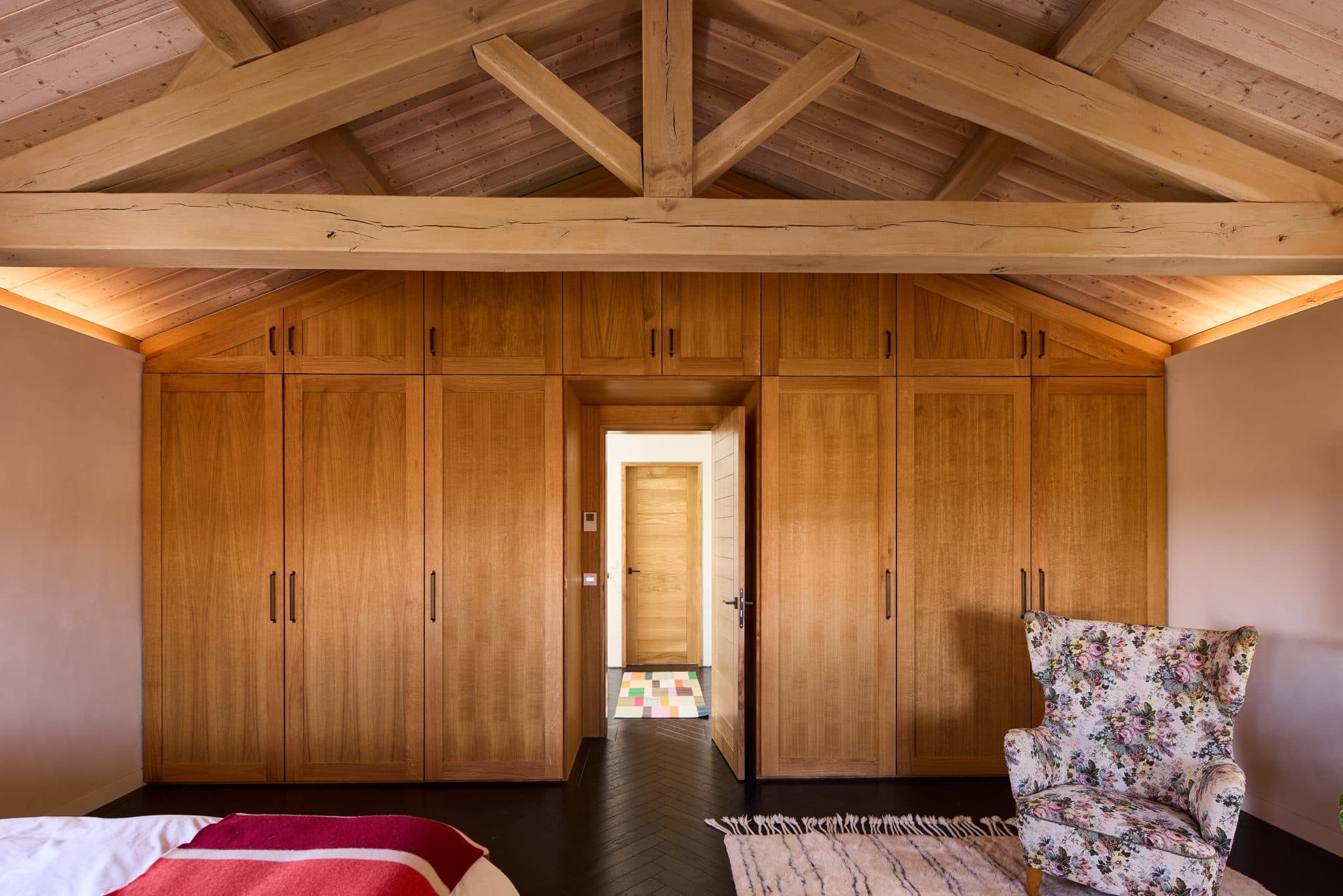 Wooden bedroom, floral armchair