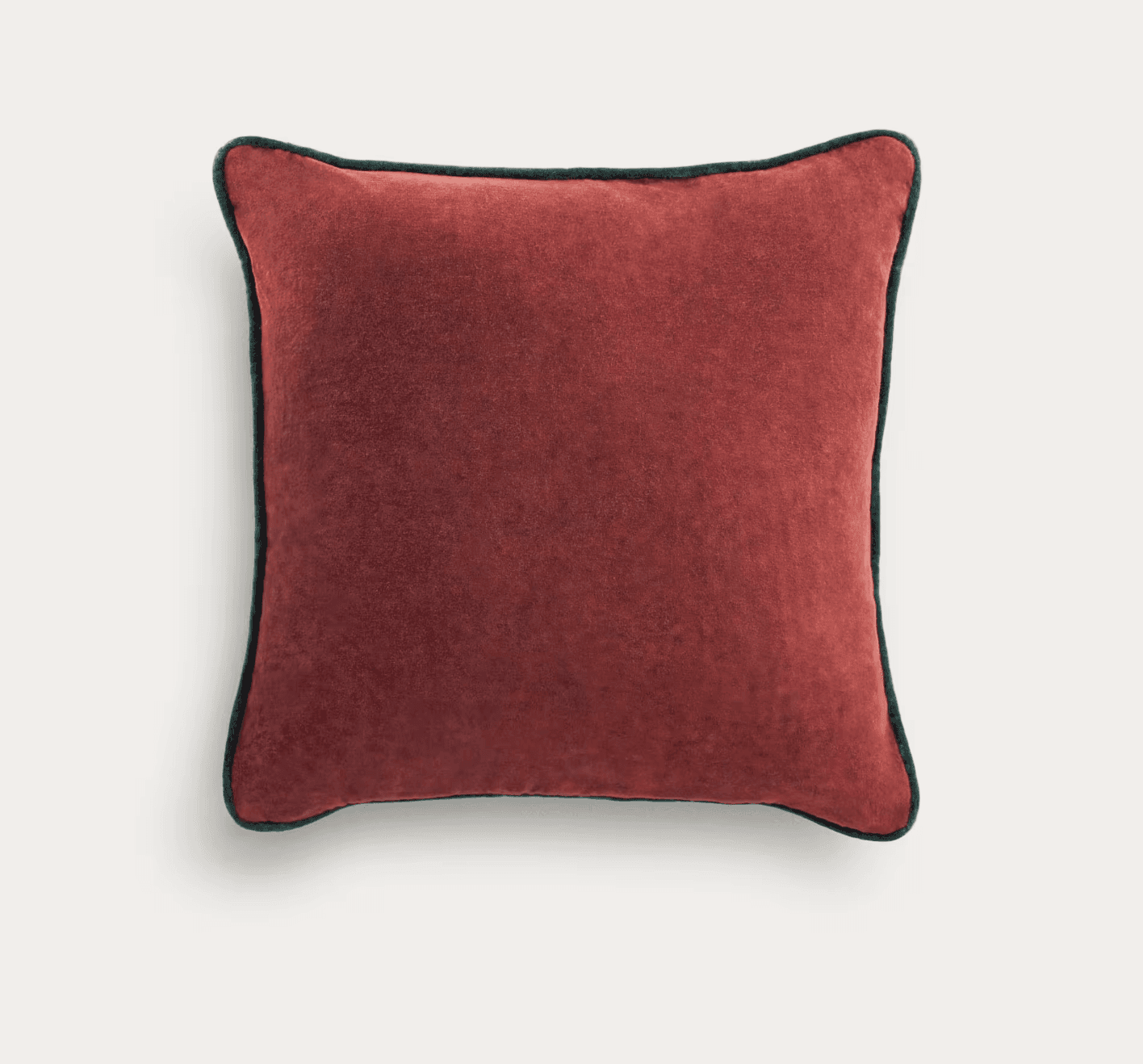 Coussin en velours rouge orangé