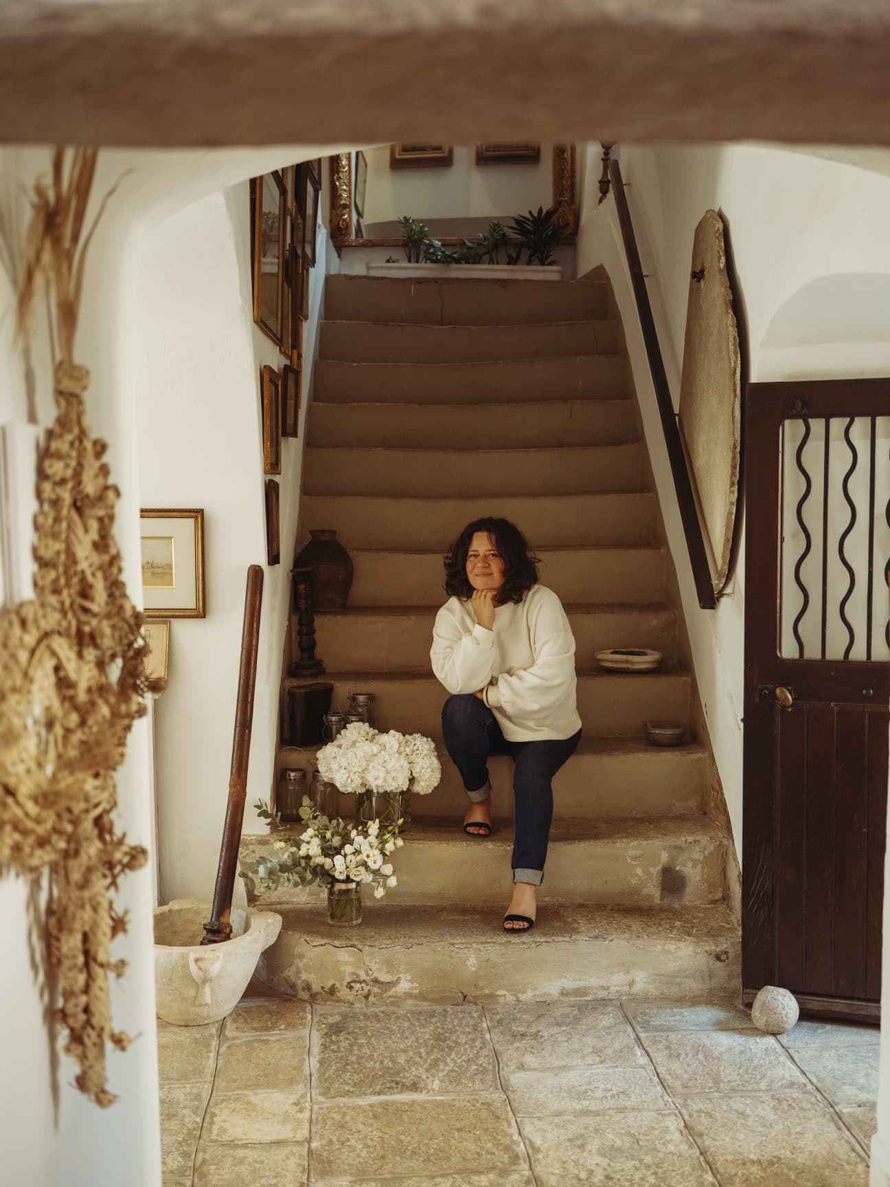 Portrait of Emmanuelle on the steps inside the Convent - © Benjamin McMahon