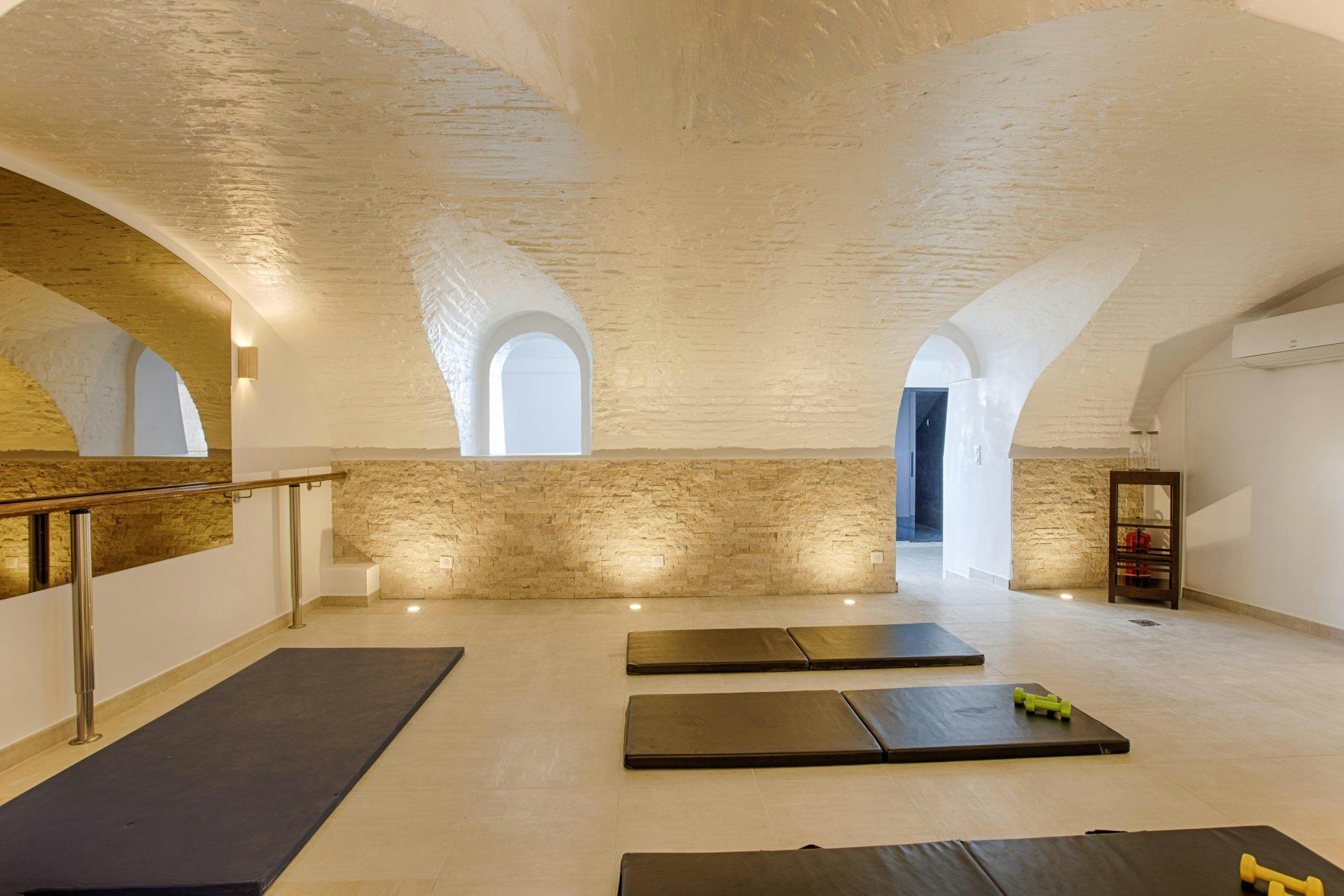 Bright, vaulted yoga room