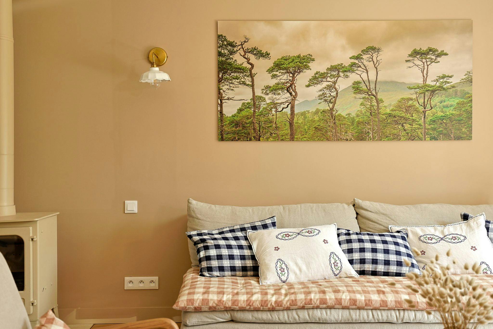 La Bien Aimée's living room: gingham blanket and beige walls