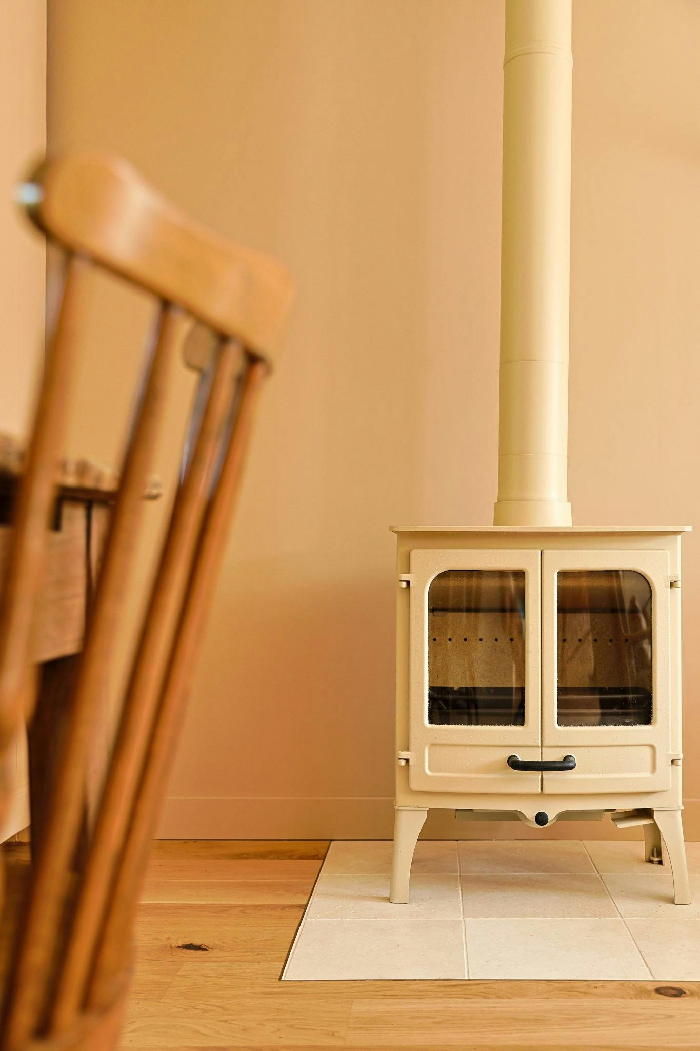 Modern vintage-style stove in the Bien Aimée's living-dining room