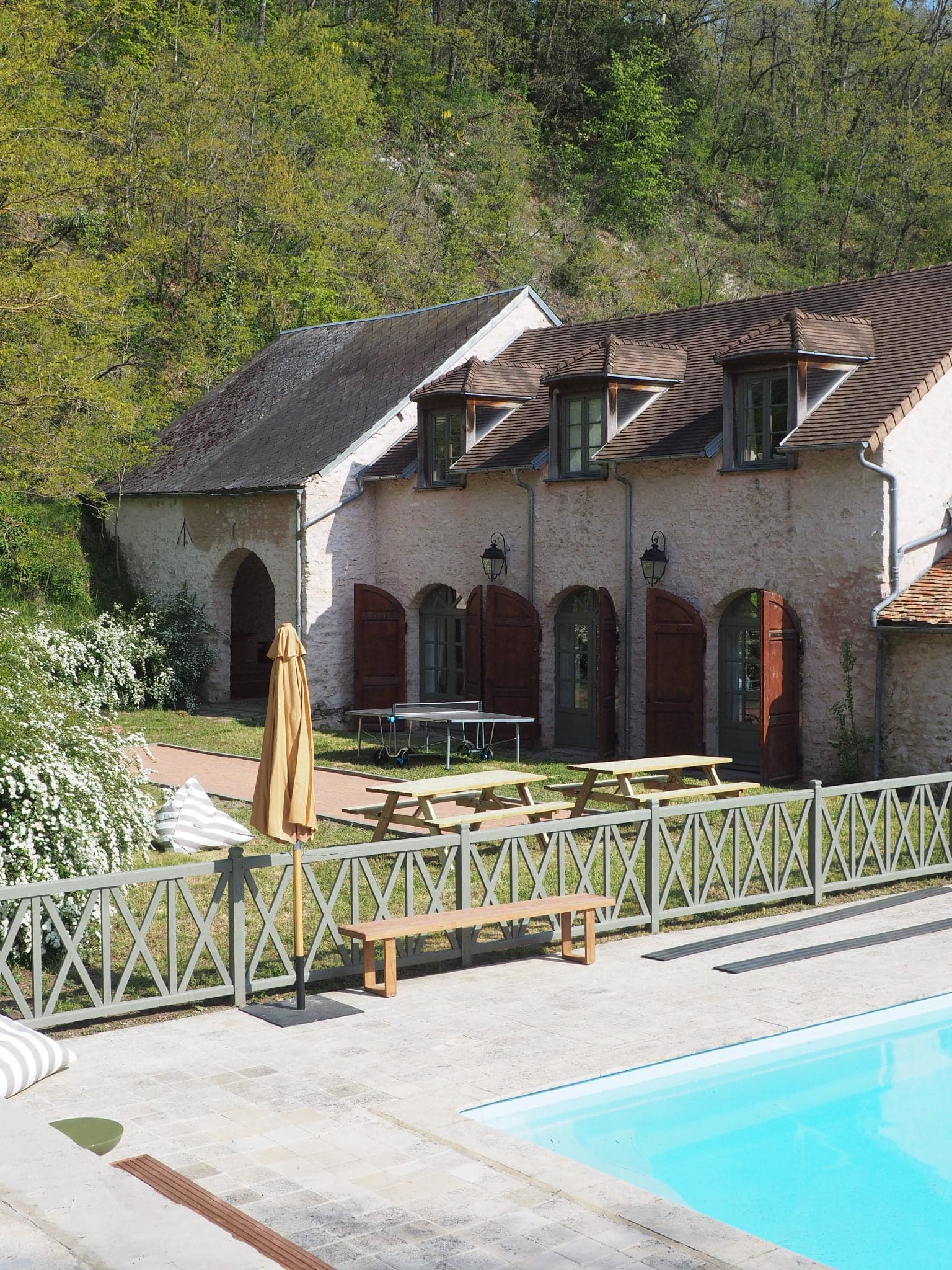 The swimming pool of La Source in the garden