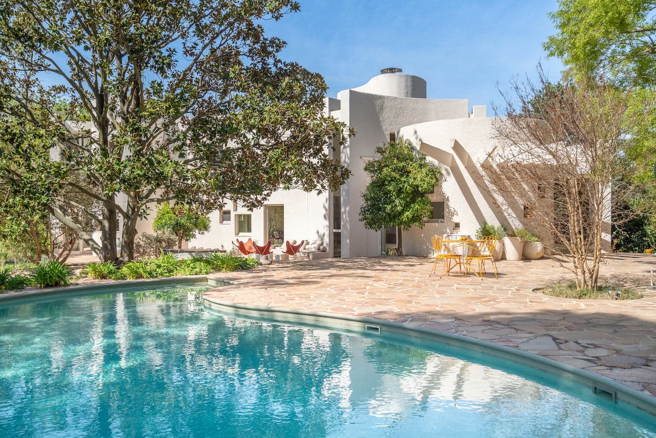The pool of Villa Bank, terrace and trees