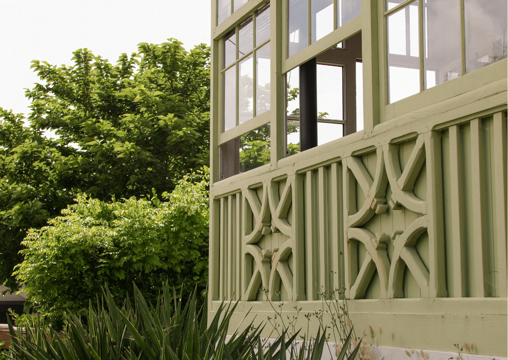 The entrance of the villa, woodwork in mint green