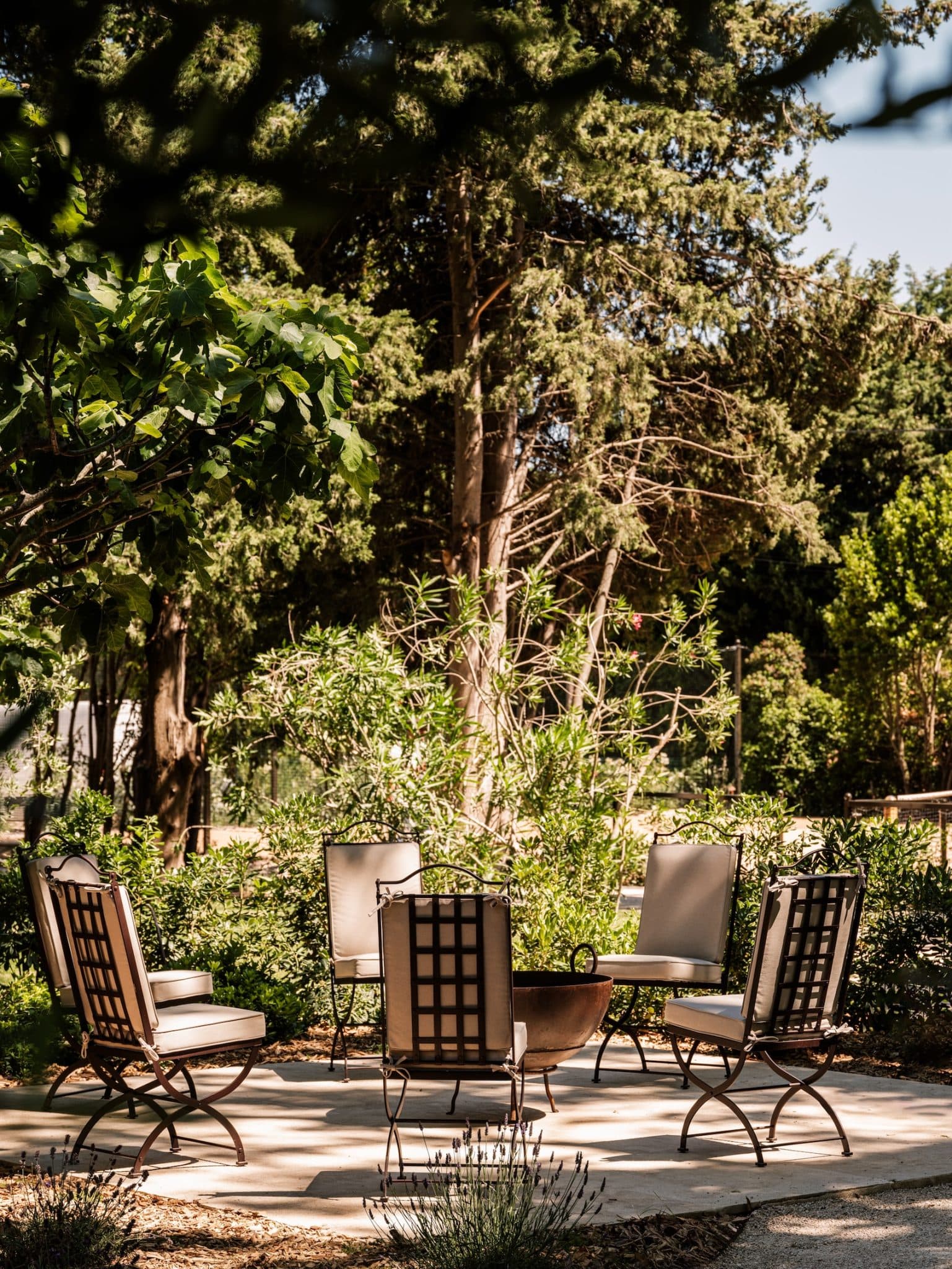 In the garden, there are plenty of cozy nooks to settle into.