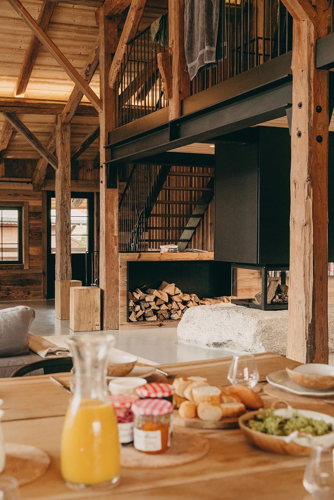 Breakfast by the large granite fireplace.