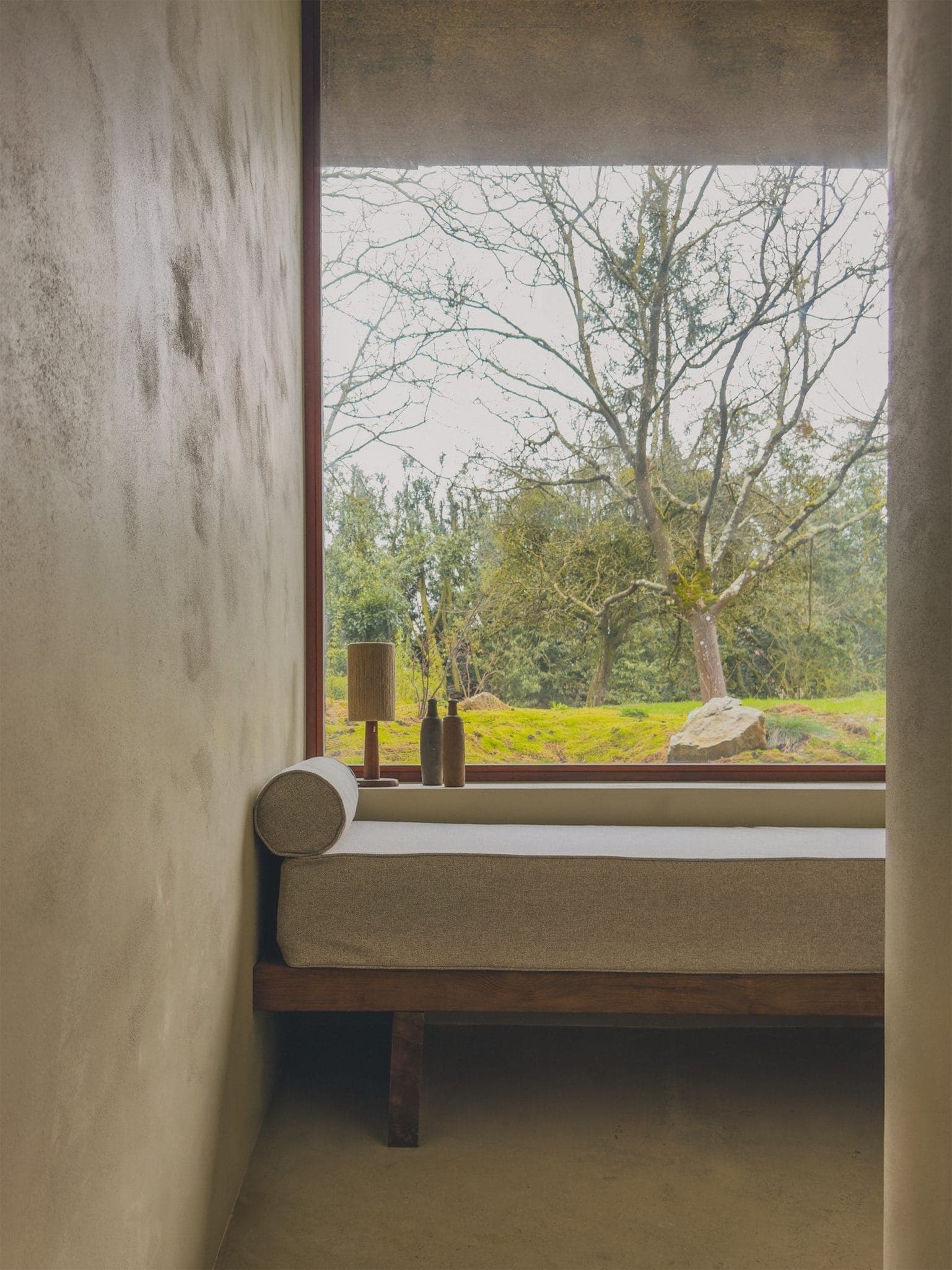 Thanks to the large windows, life at Namō Ryokan seamlessly blends indoor and outdoor living.