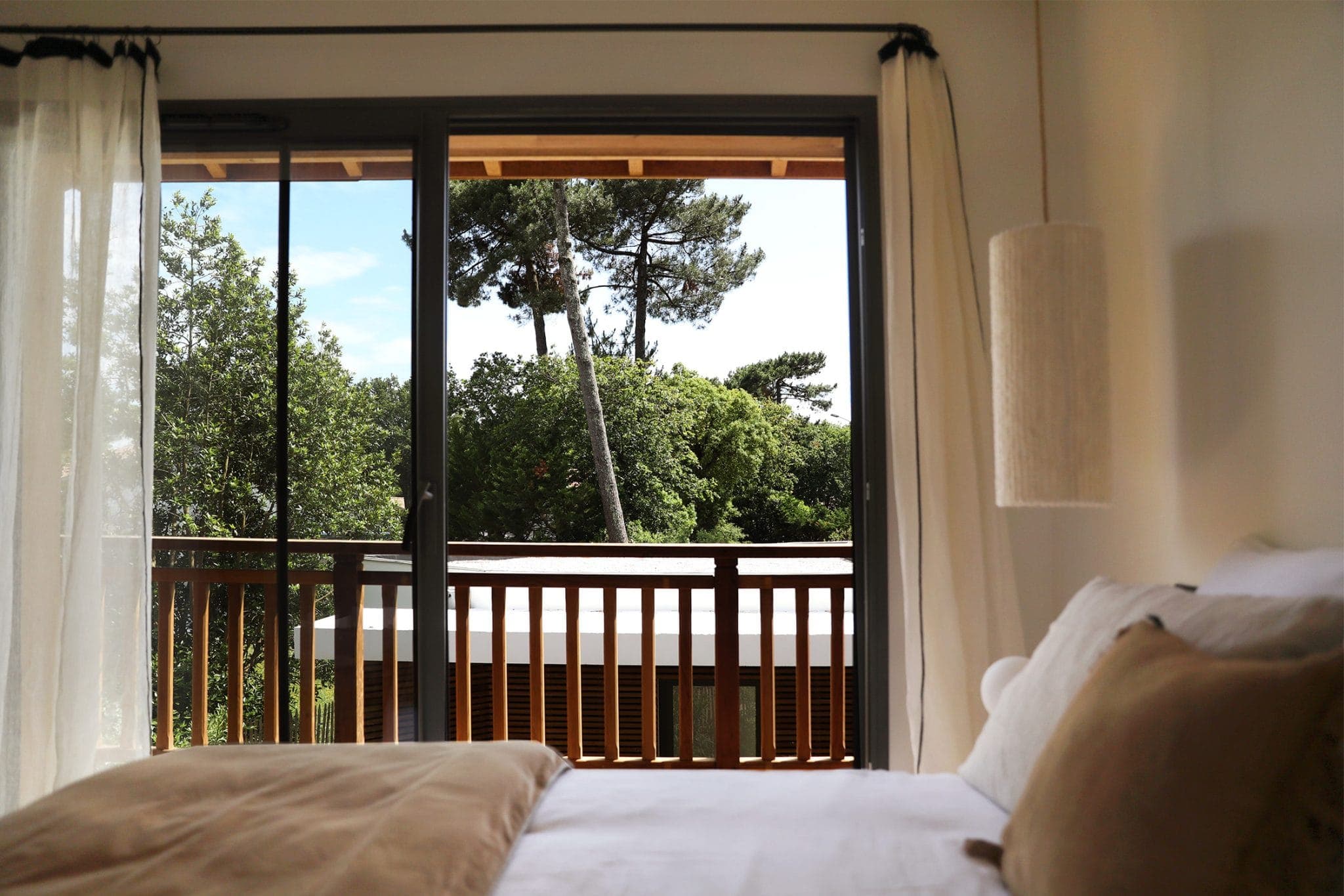Nestled between greenery and pine trees, Maison Ernest.