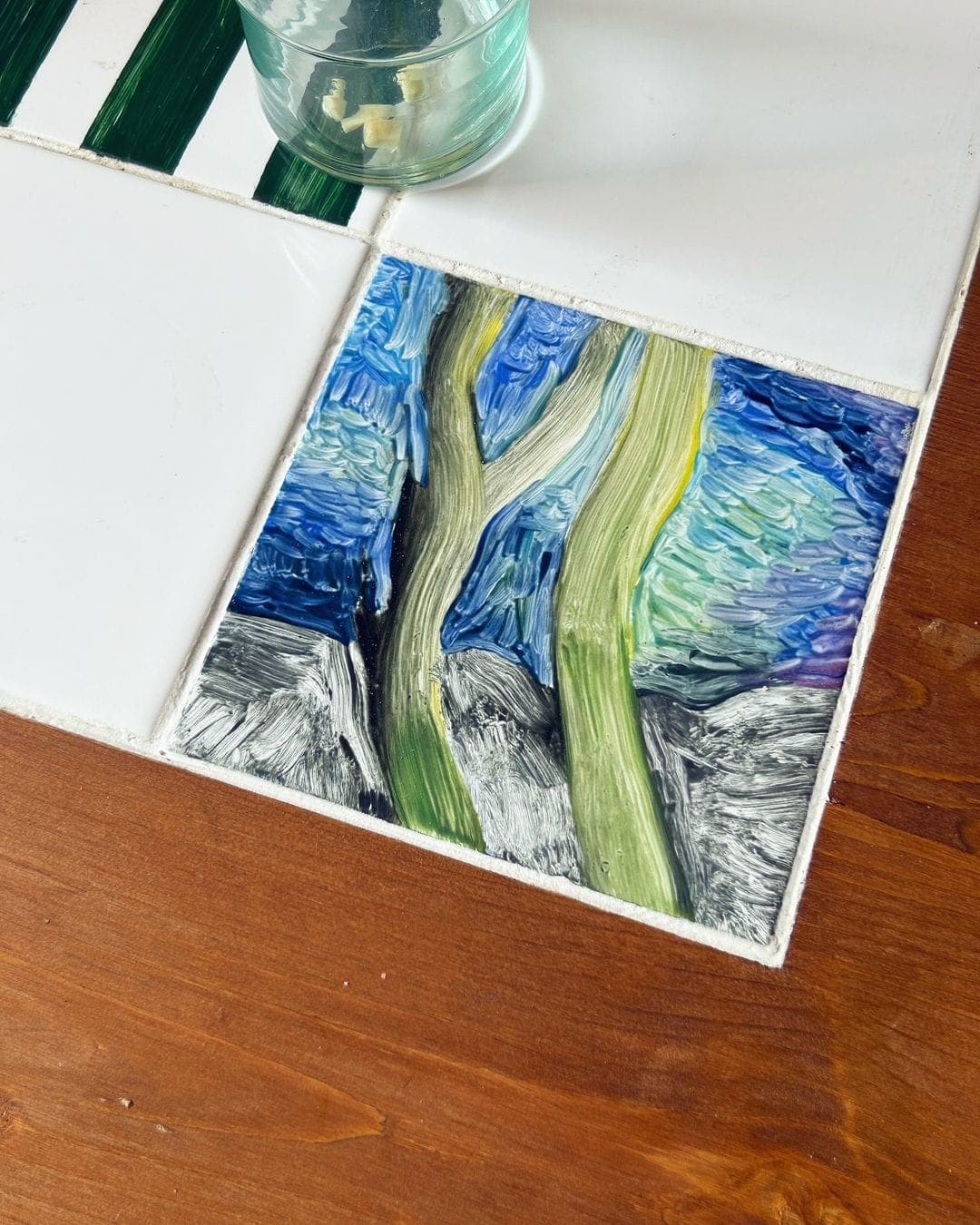 A tile painted by the Jacent duo.