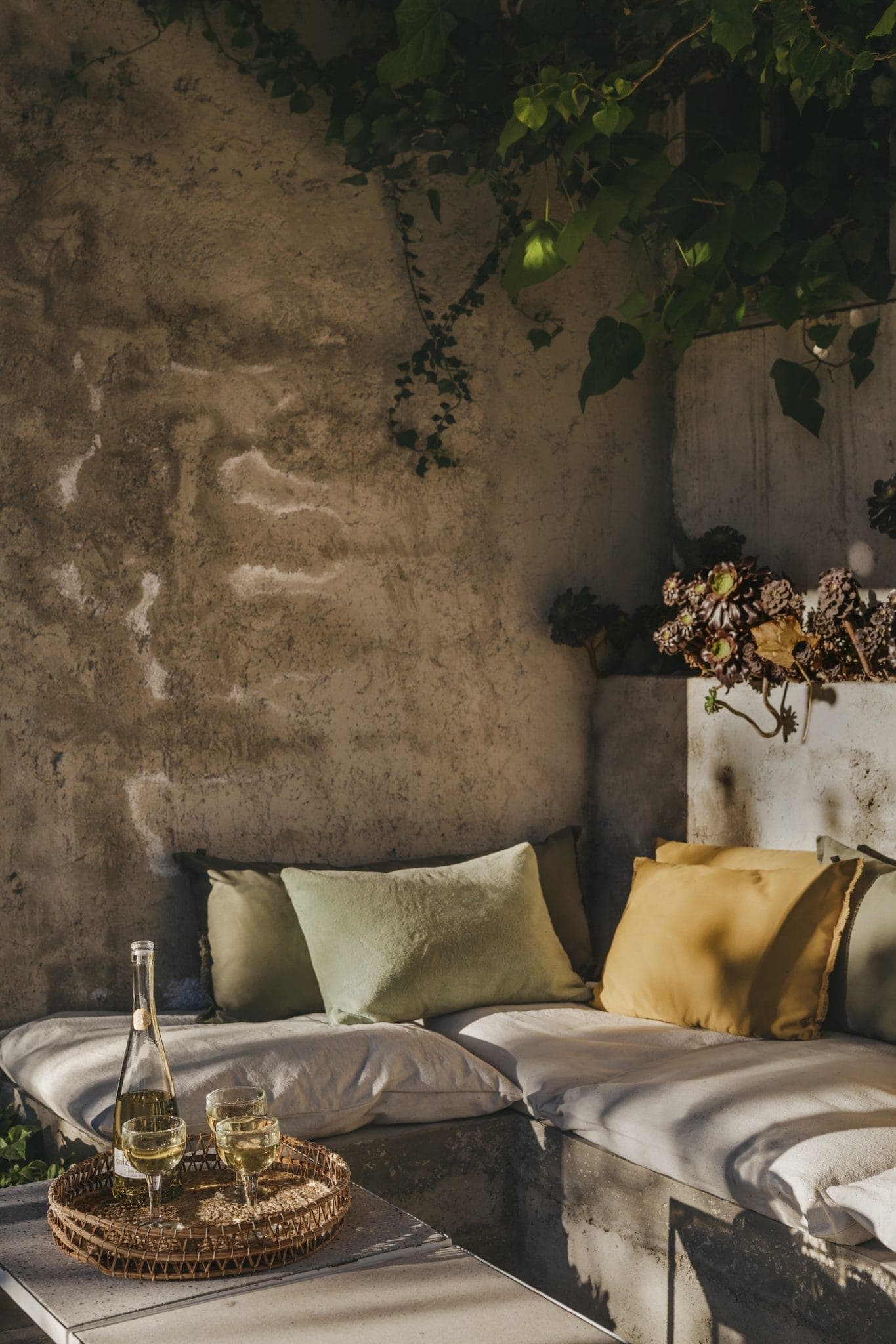 The charming summer lounge nestled in the courtyard.