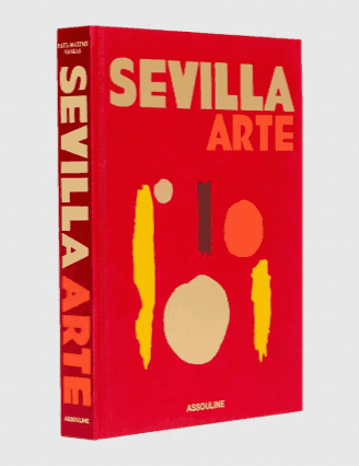 Un livre rouge à couverture rigide intitulé « SEVILLA ARTE » avec des formes abstraites beiges, orange et rouge foncé sur la couverture. Le titre est également inscrit en gras jaune-orange sur le dos.