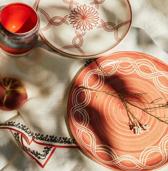 red plate in a sunny table