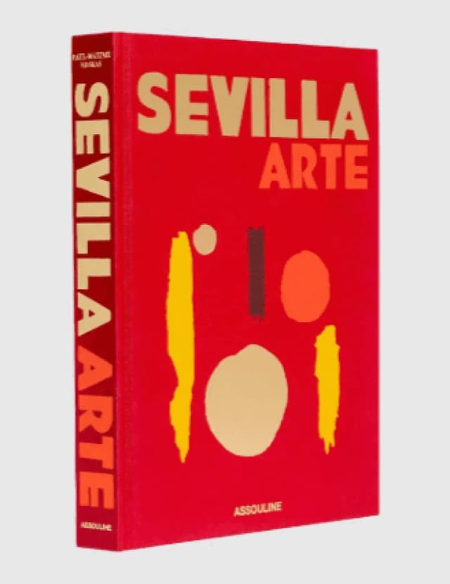 Un livre rouge à couverture rigide intitulé « SEVILLA ARTE » avec des formes abstraites beiges, orange et rouge foncé sur la couverture. Le titre est également inscrit en gras jaune-orange sur le dos.