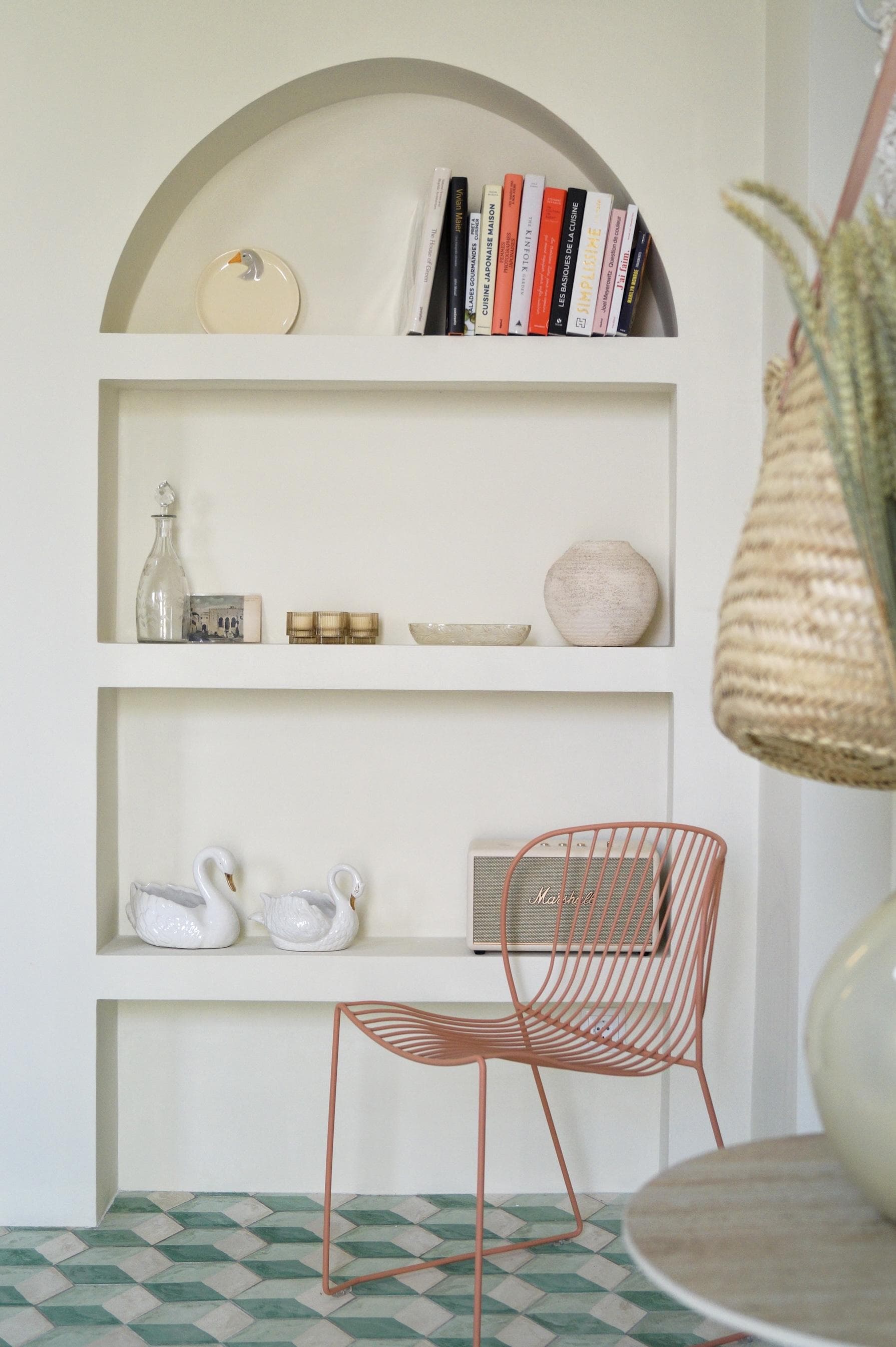 Handcrafted trinkets and pastel colors adorn the interiors.