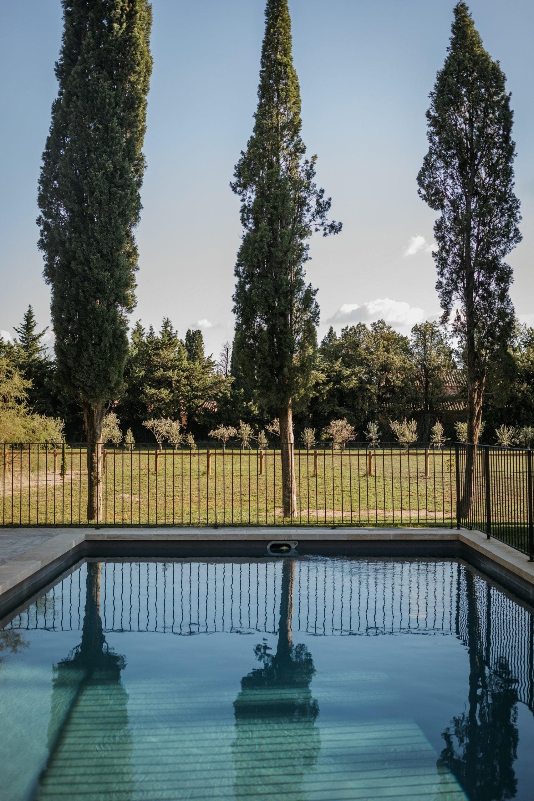 The pool under the cypress trees at Mas des Écoliers. © Melissa Fabri Photography