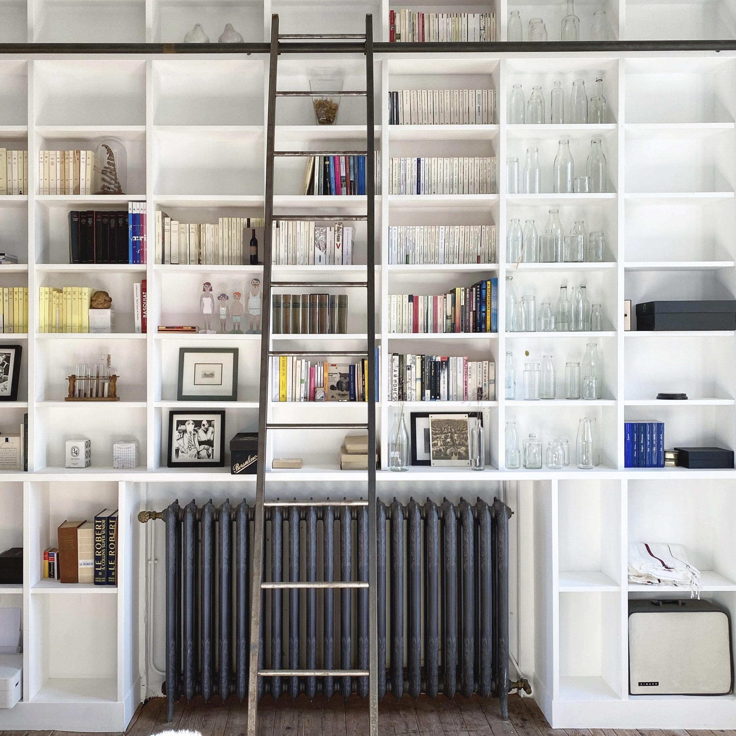 The library on the wall in the living room