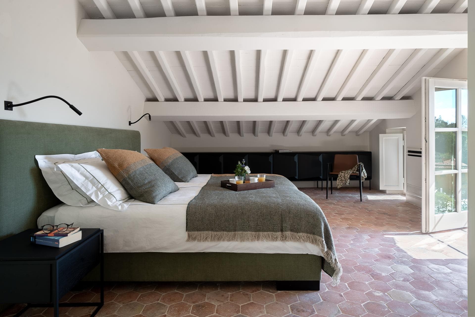 You wake up to views of vineyards and olive groves.