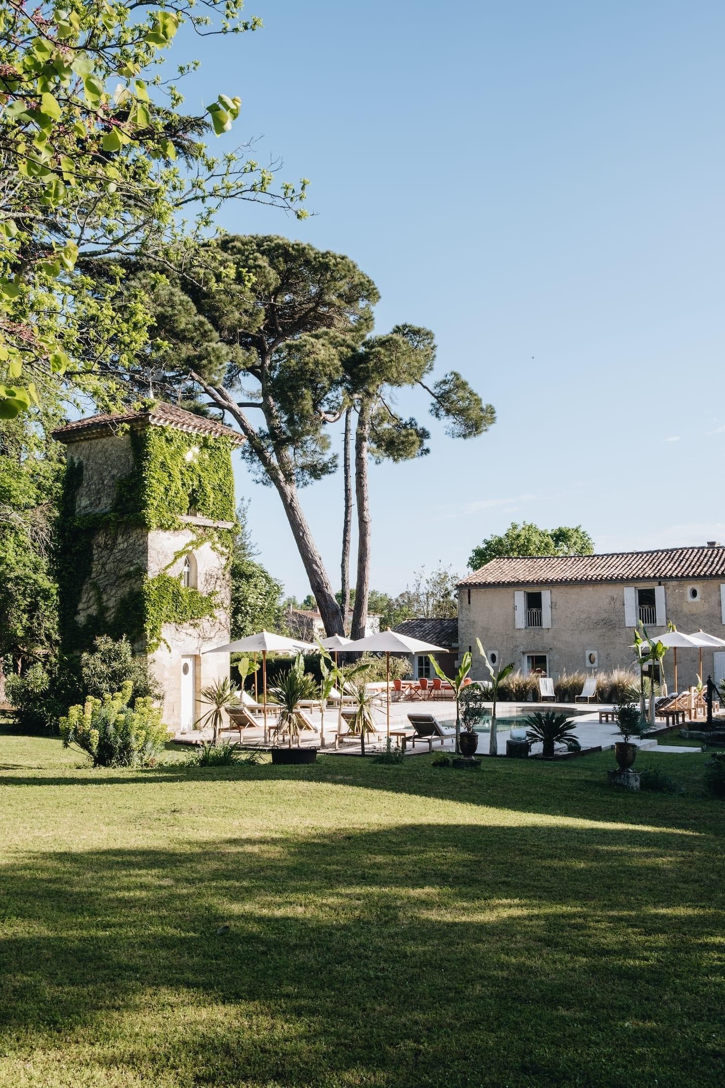 The lush courtyard of Château Réal.