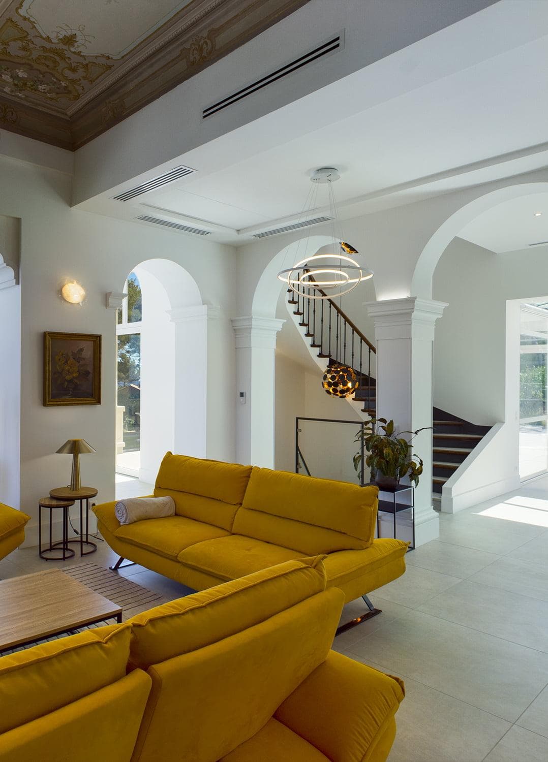 Painted ceiling in the living room, bearing witness to the house's history