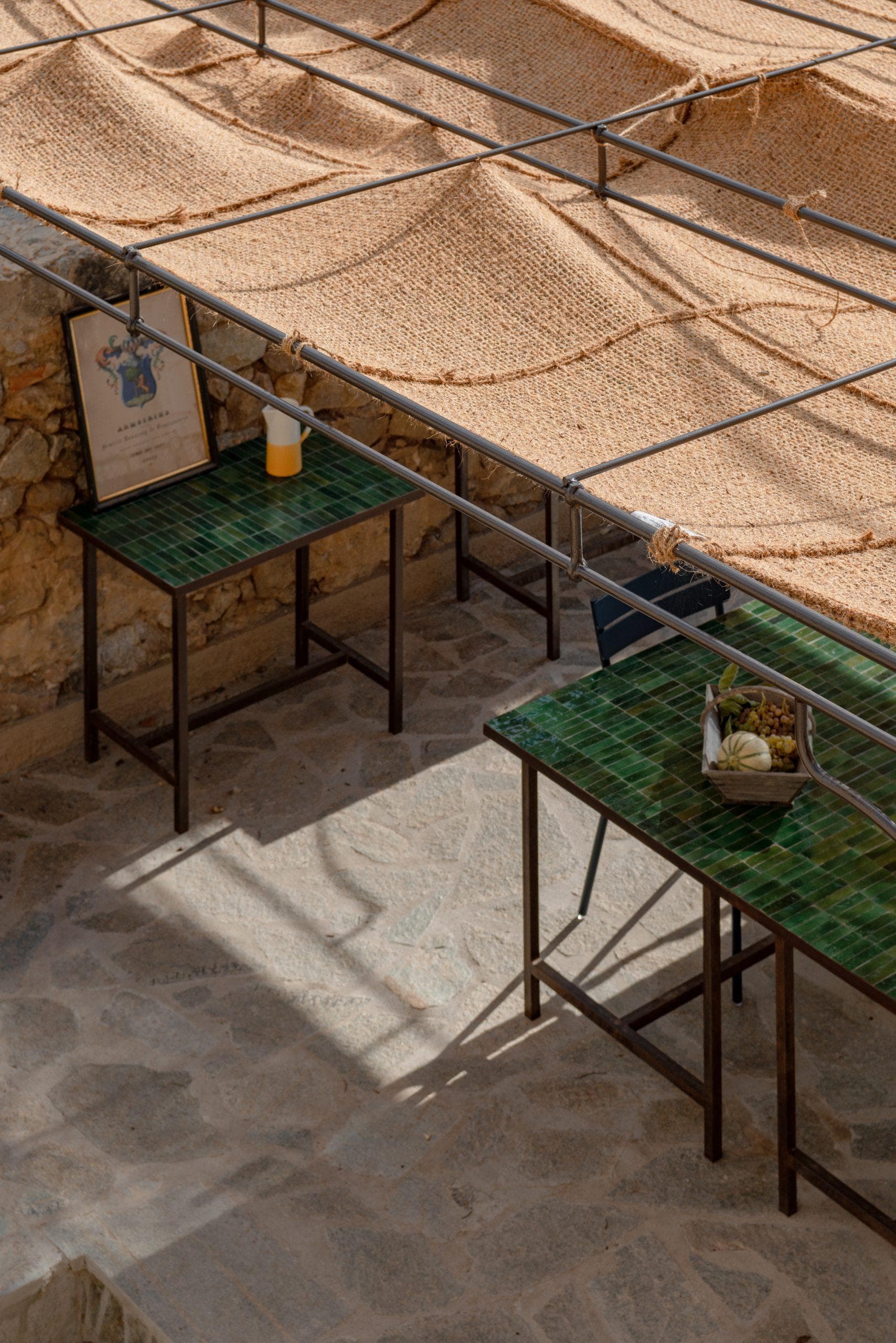 Barefoot lunch under the pergola.