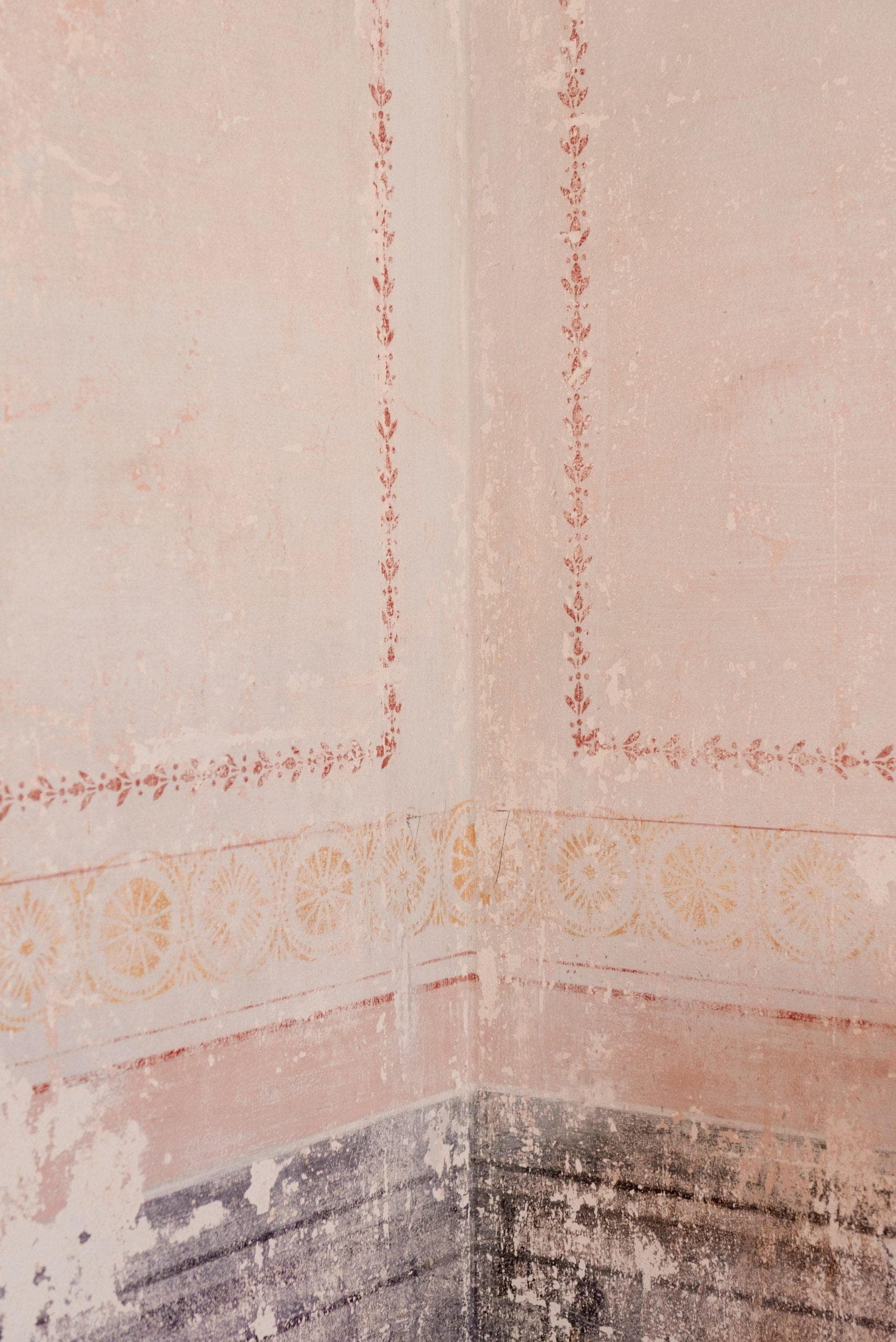 Meticulously restored wall frescoes, a testimony to the years these walls have passed through