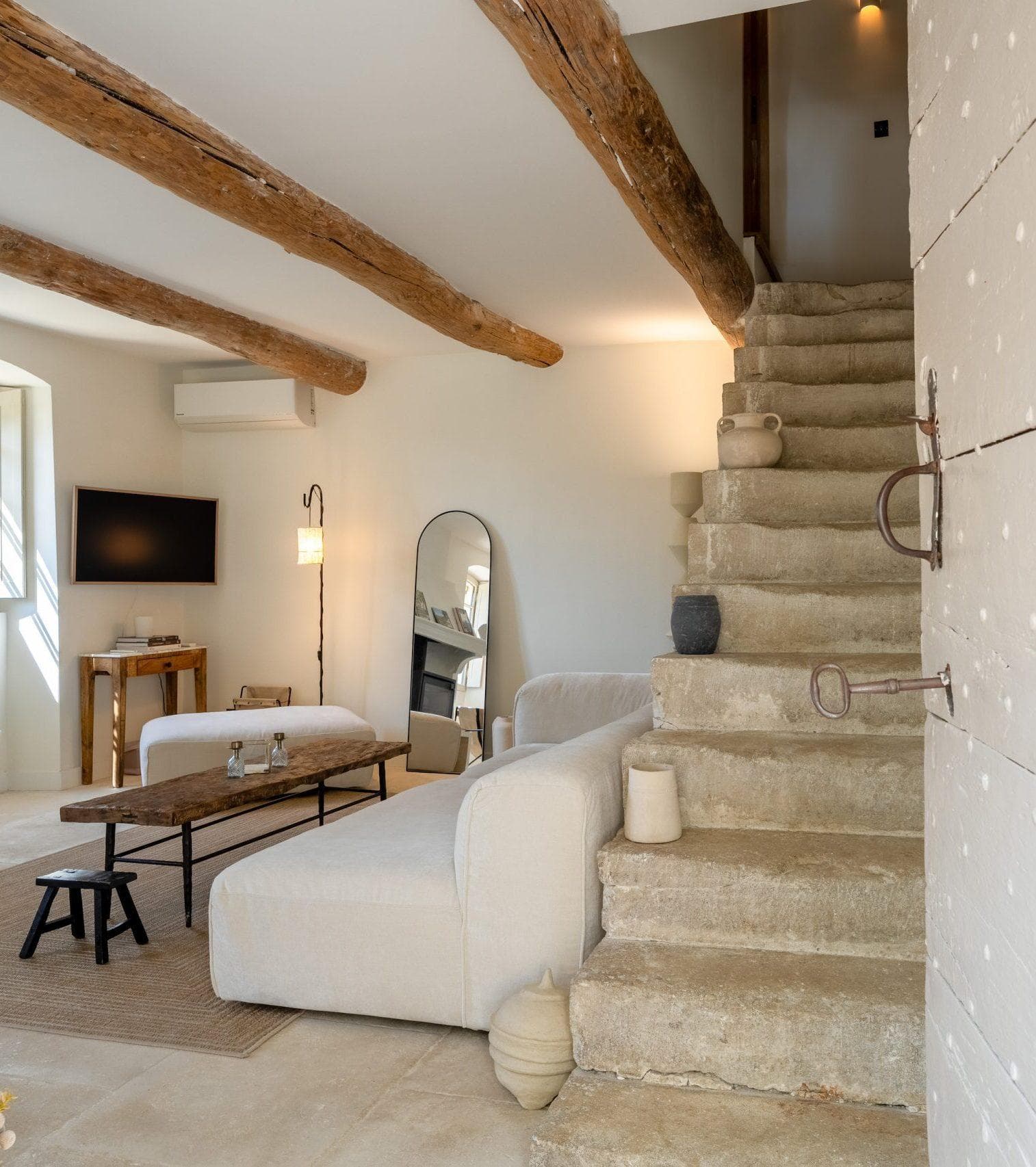 From the moment you enter, you are greeted by the stunning original stone staircase.