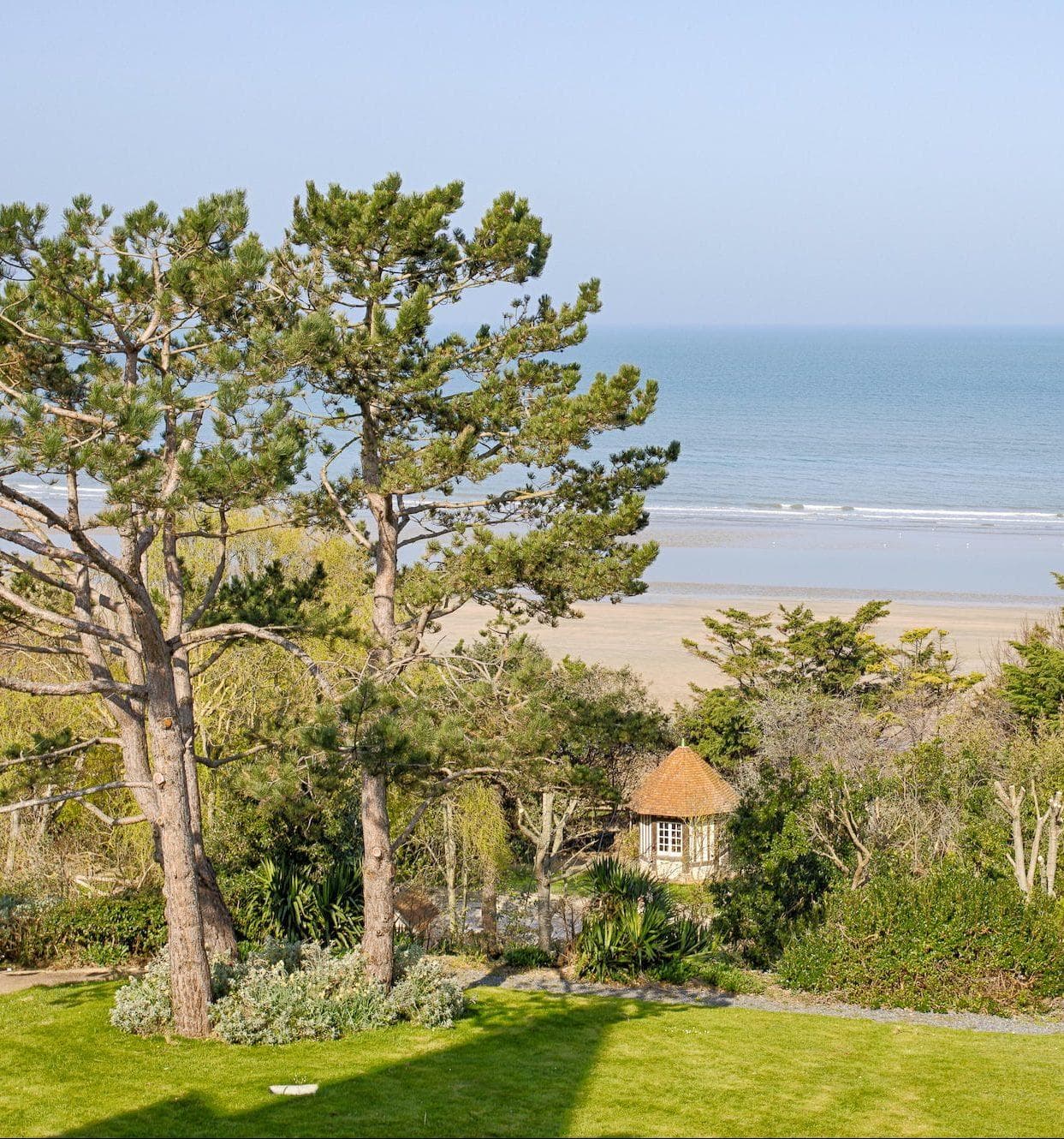 At the end of the garden at L'Abbaye de Deauville, the sea!