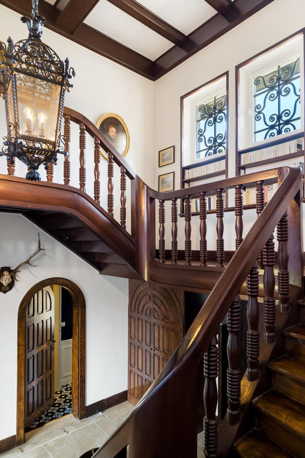 The beautiful solid wood staircase at Villa Iratz Aldea.