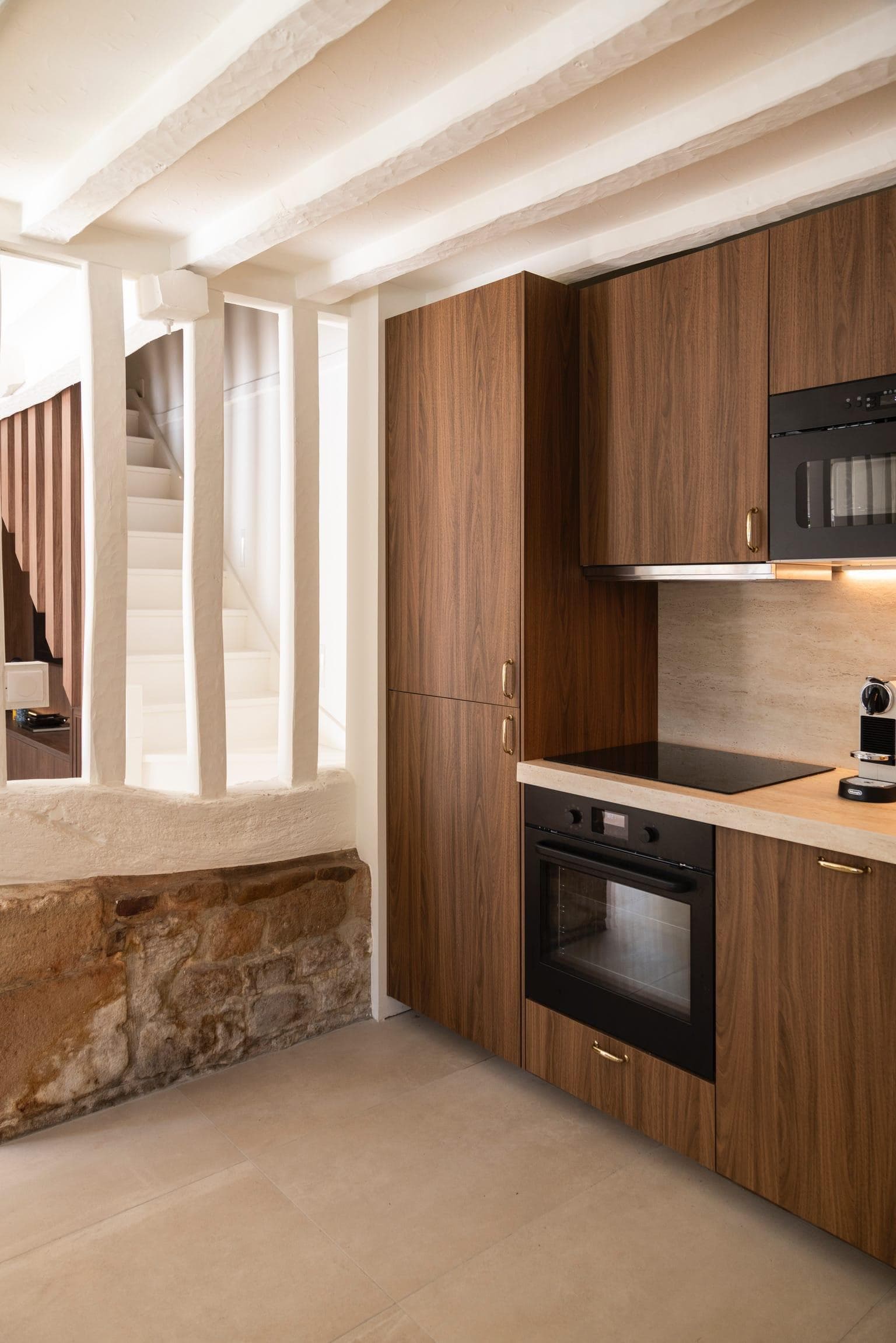 The custom-made wooden kitchen.