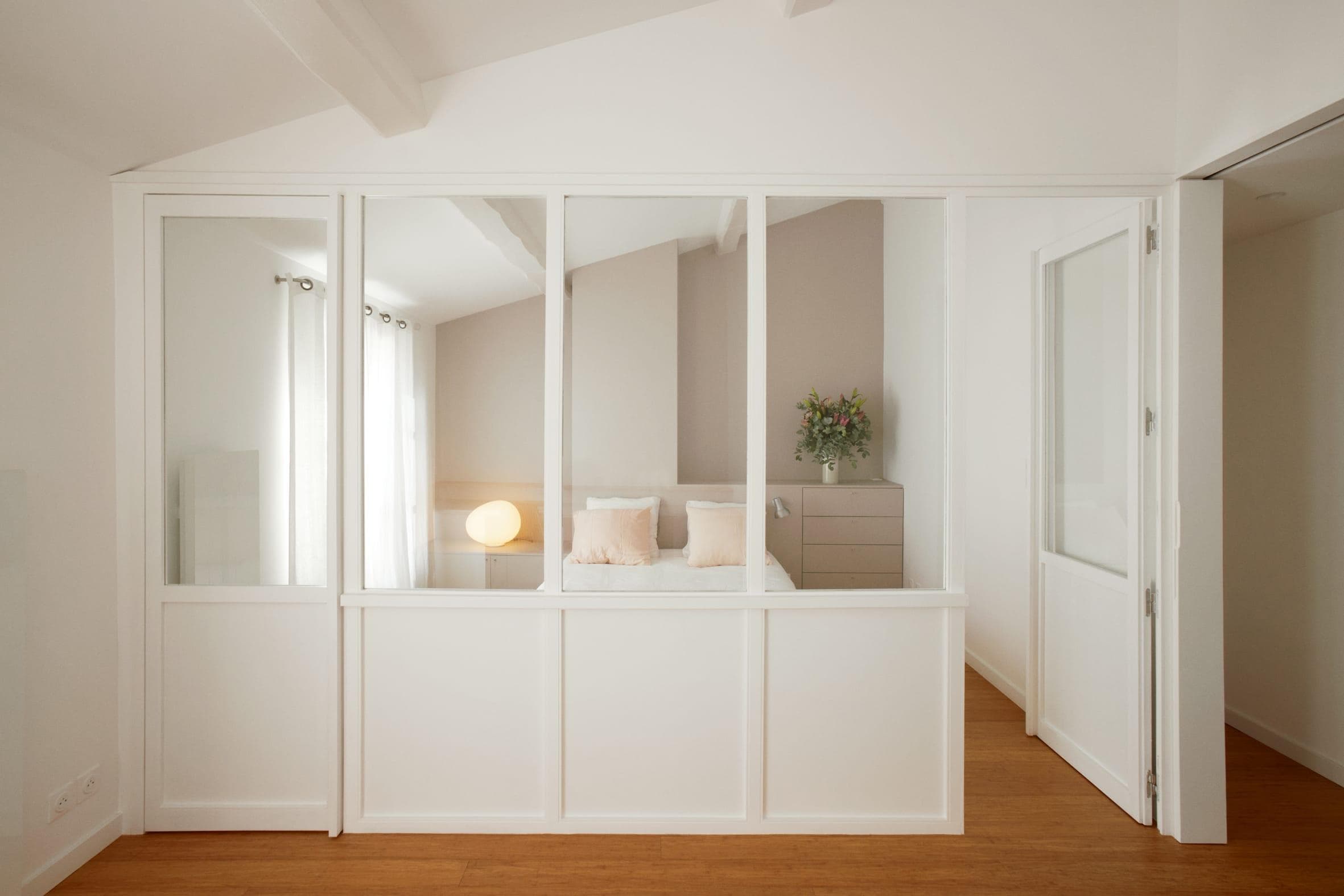 Upstairs, the master suite evokes the charm of an artist’s studio.