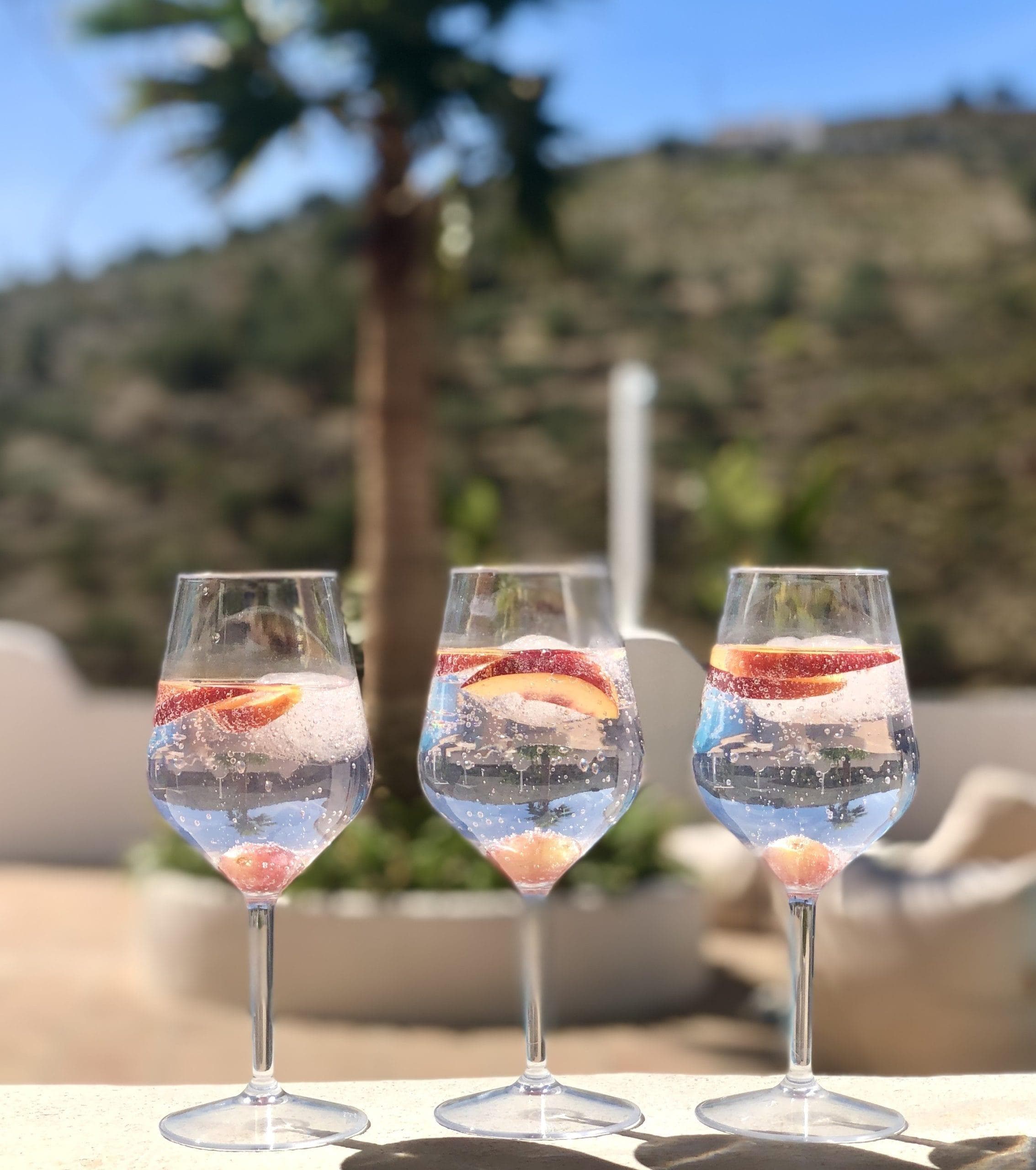 As evening falls, we sip a drink while watching the sunset.