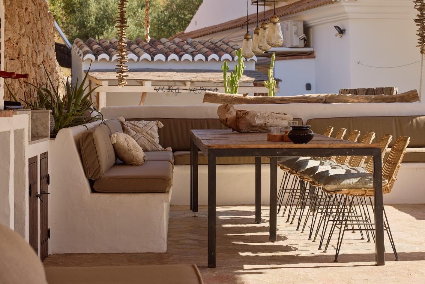 Beneath the pergola, it's tapas time.