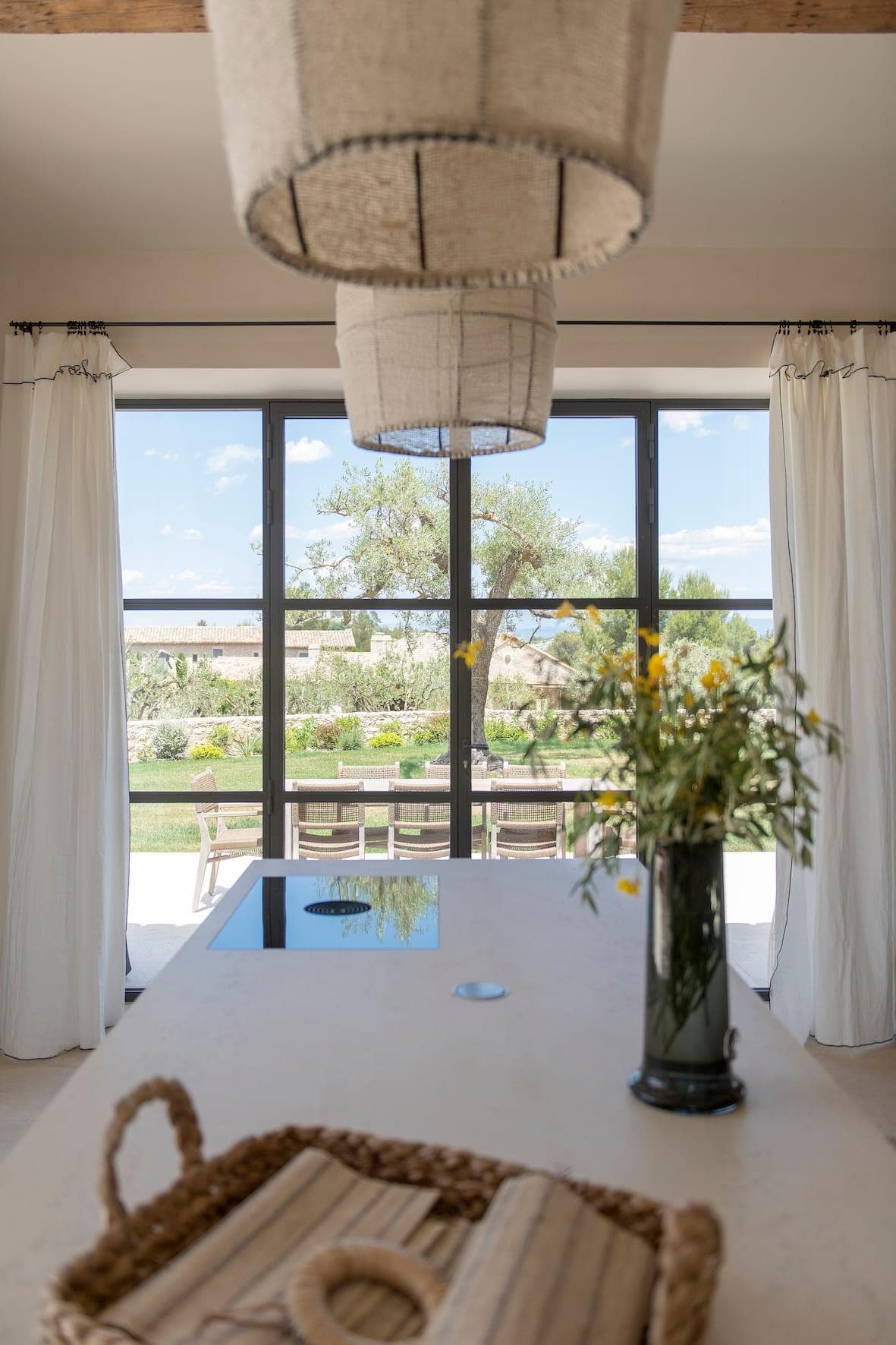 The charming kitchen opens out to the outdoors.