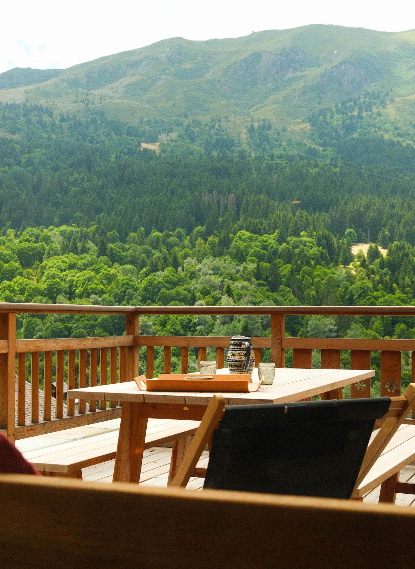 In summer, guests can enjoy the large terrace and views of the mountain peaks.