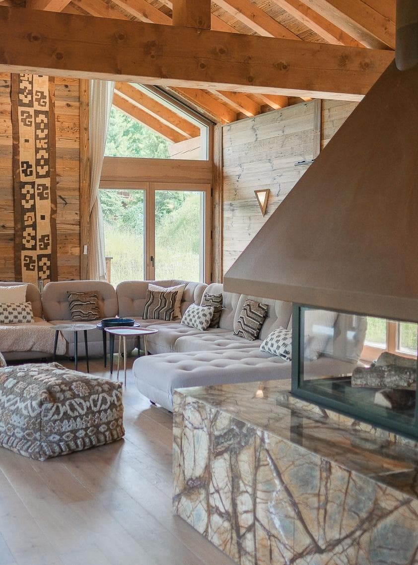 The heart of the chalet: the large central fireplace in the living room.