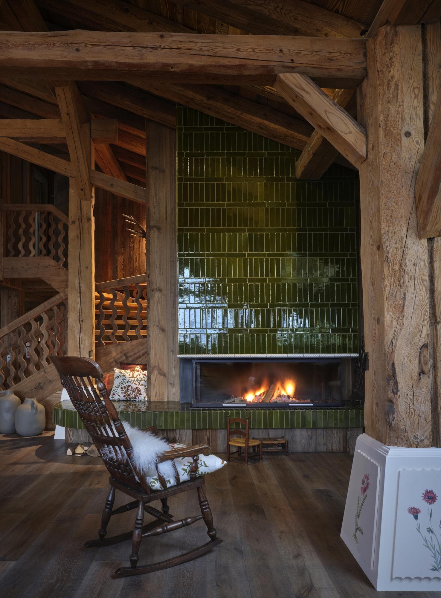 Fireplace in Chalet La Ferme du Petit Bois.