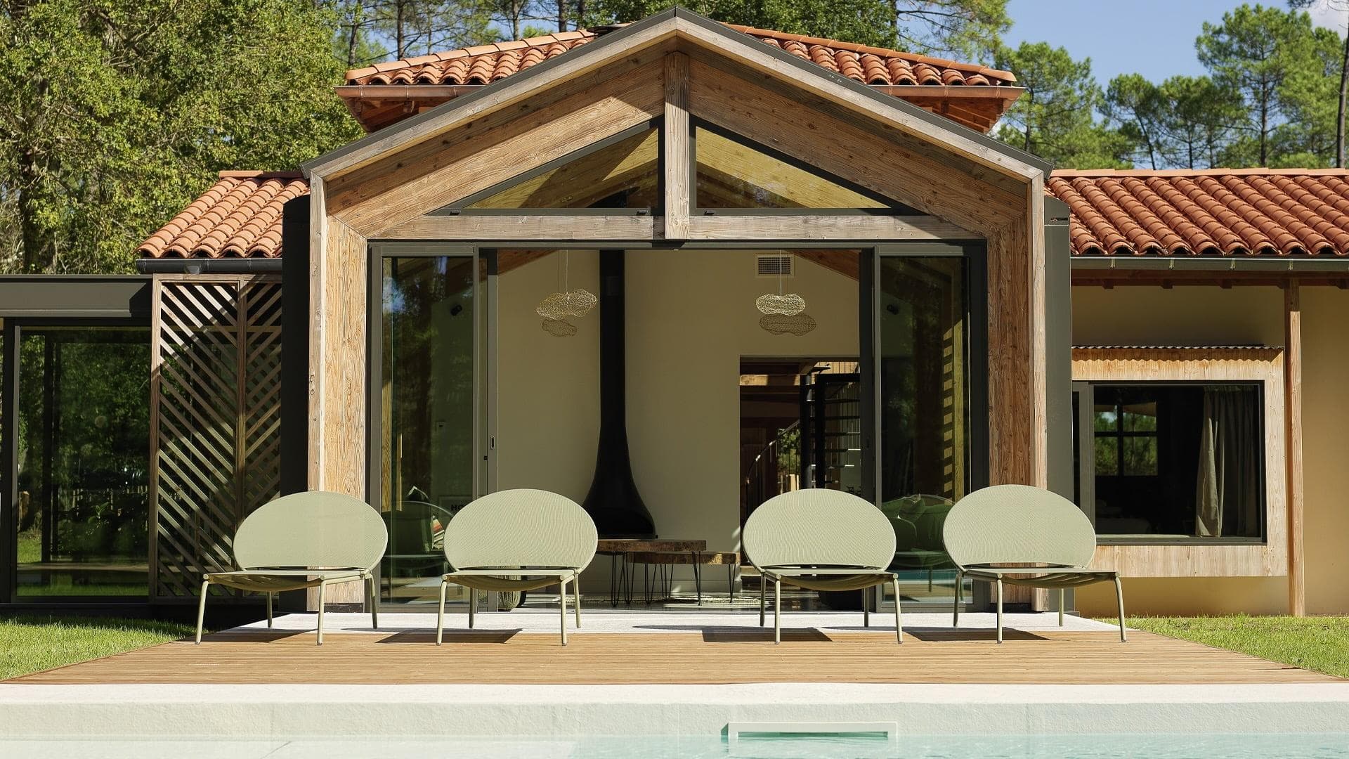 view of the house and deckchairs